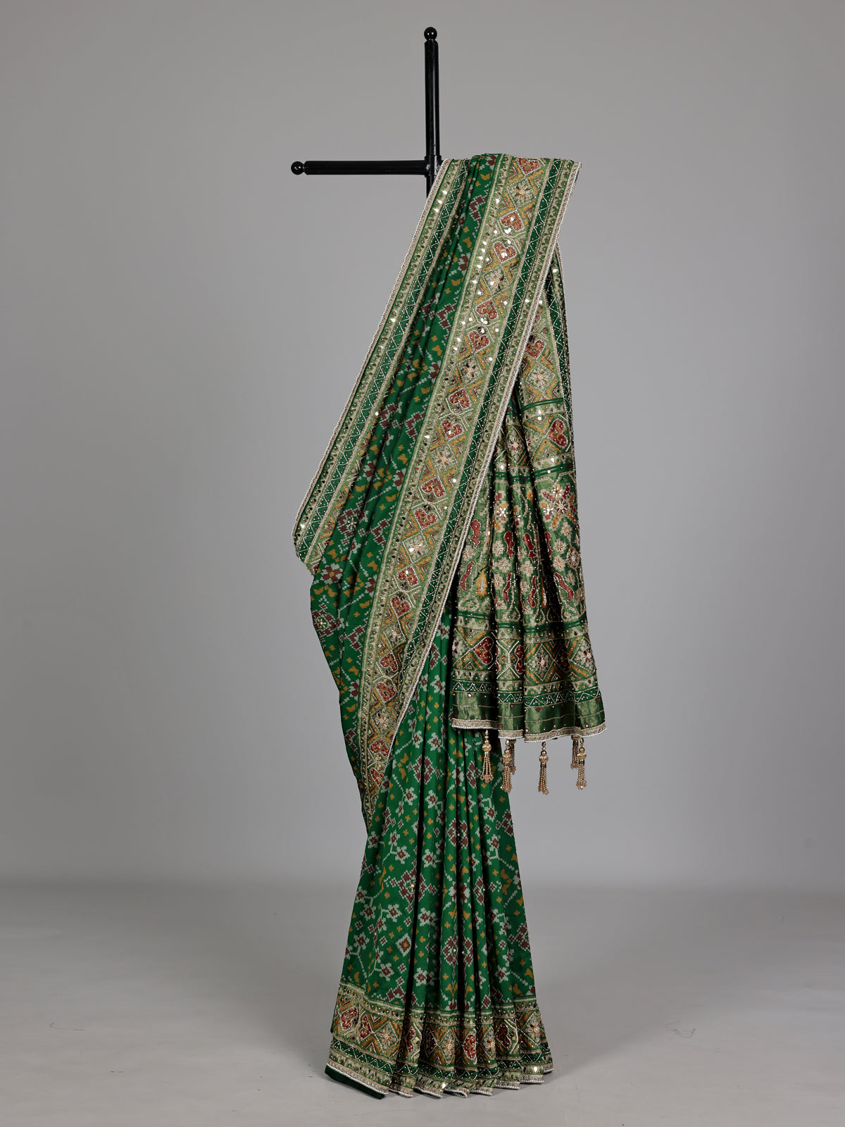 Emerald green semi silk Patola motif zardosi saree
