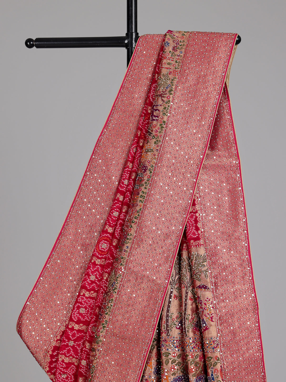 Rani pink Bandhani pattern figurative embroidered festive saree