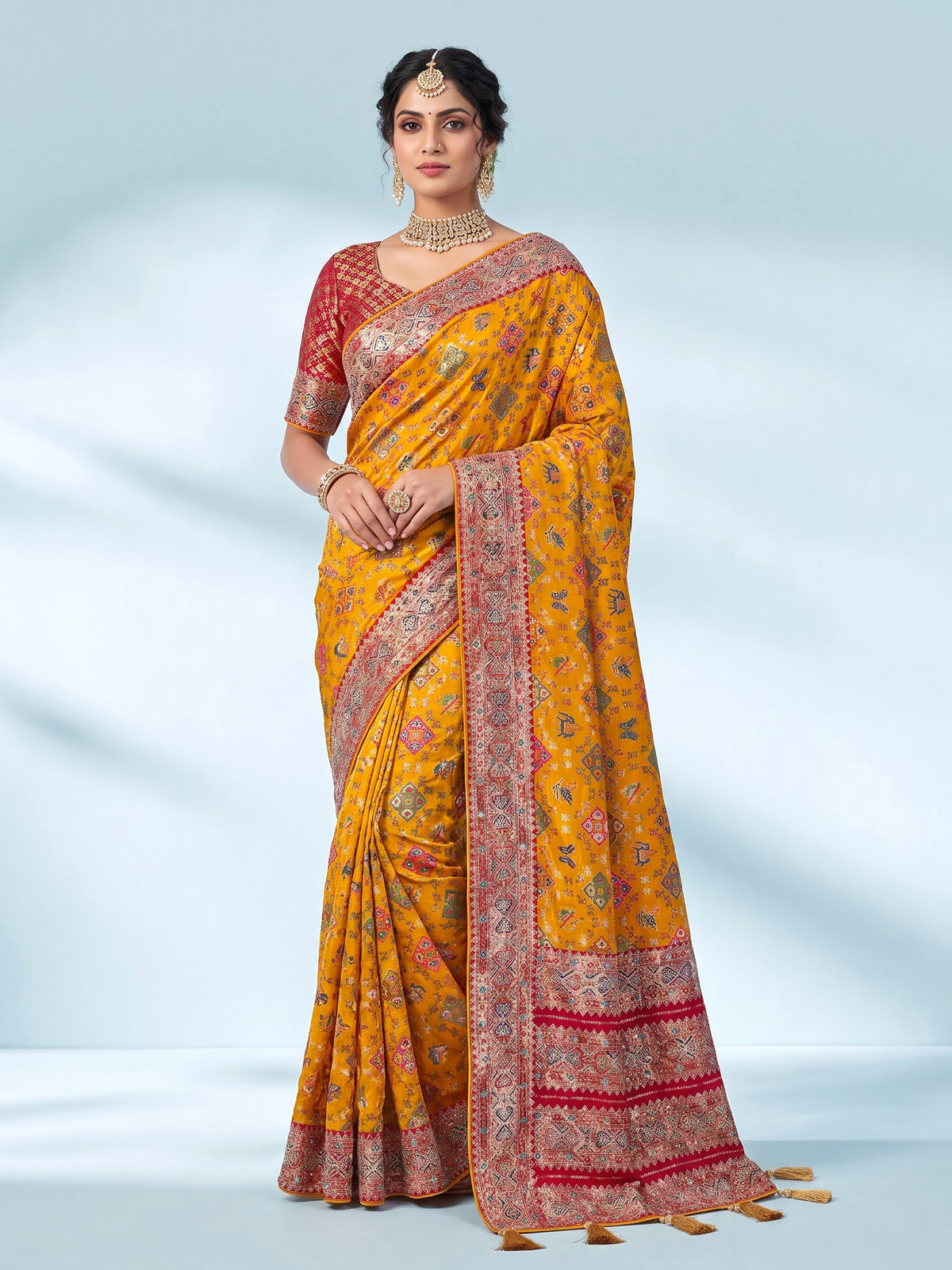 Mustard yellow modal silk Patola motif zari work saree