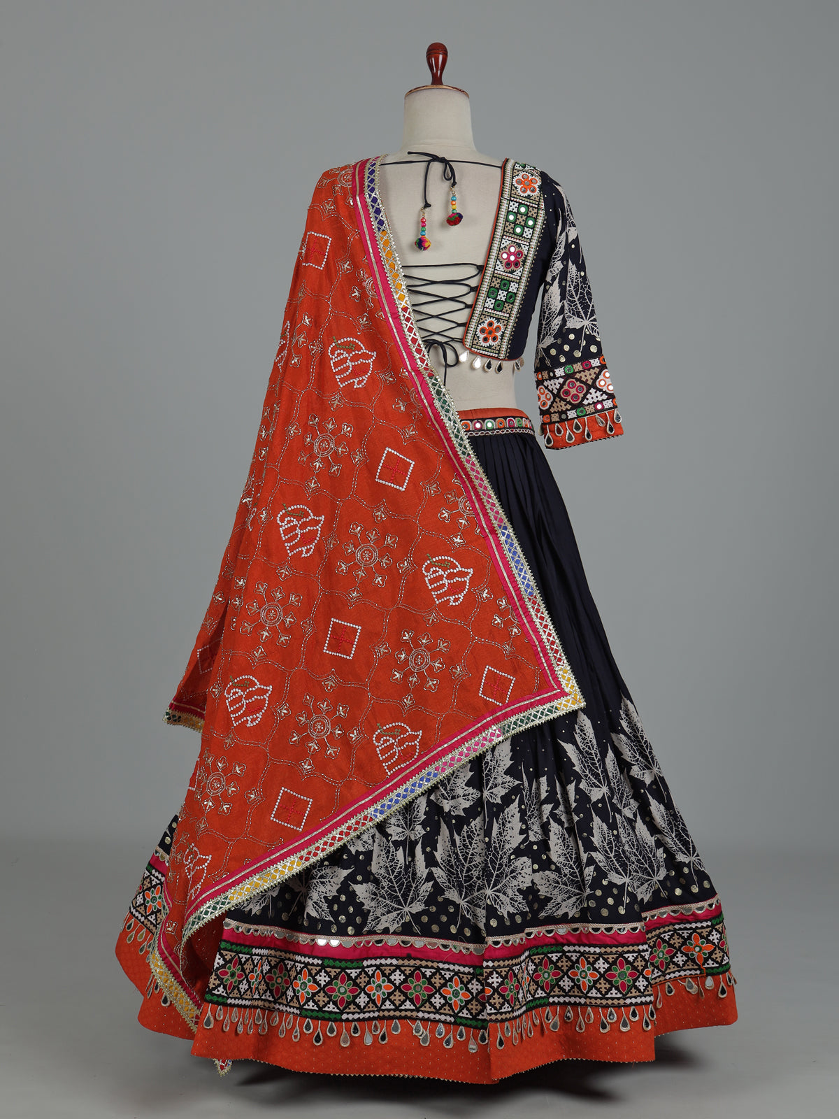 Black cotton silk chaniya choli with mirror and cowrie work