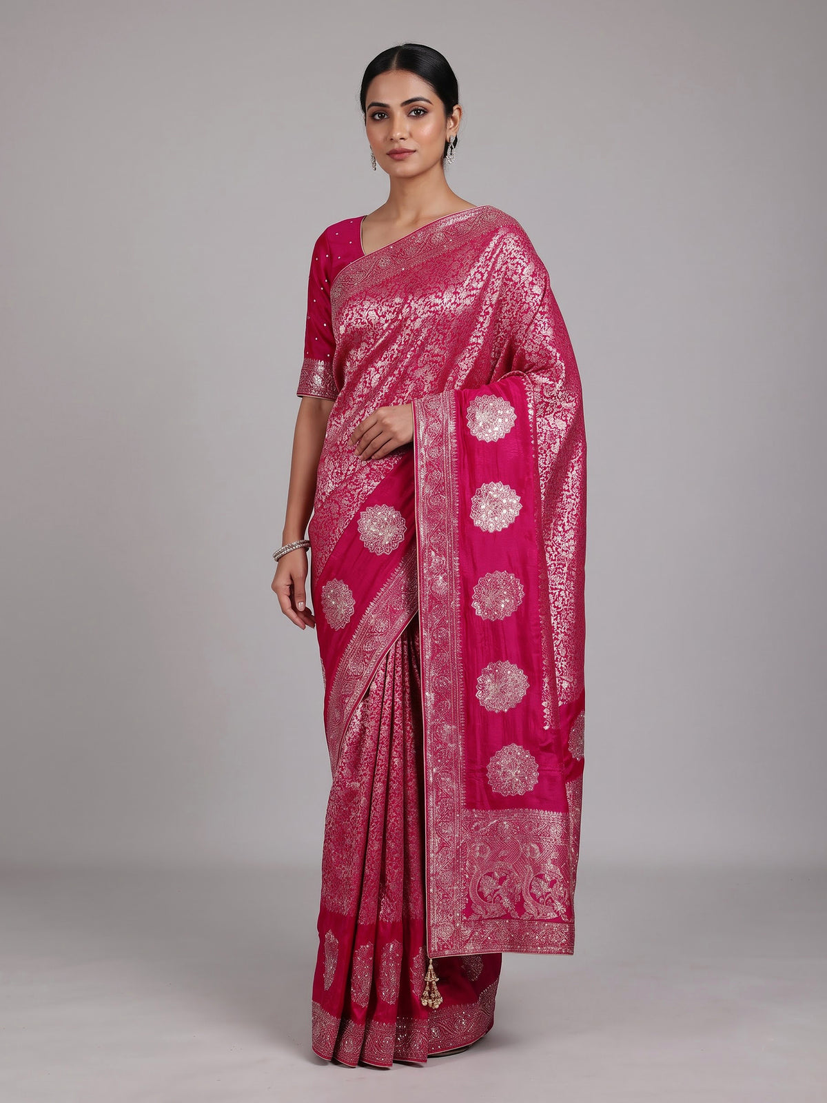 Rani pink metallic embellished dola silk saree