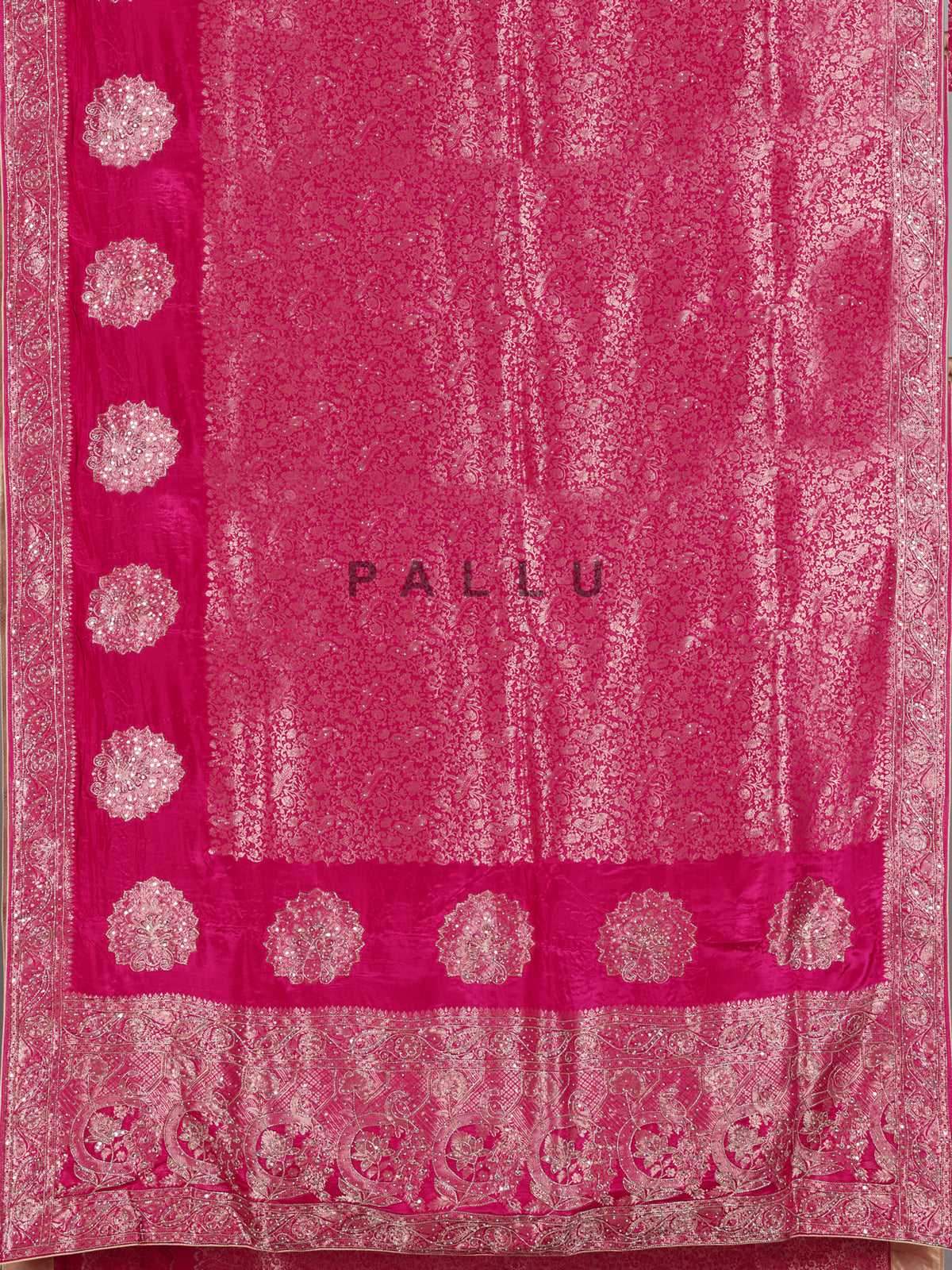 Rani pink metallic embellished dola silk saree