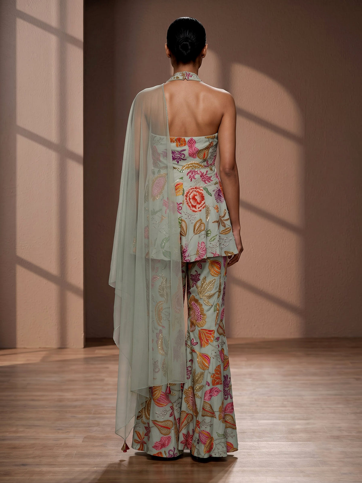 Pista green floral silk palazzo suit with mirror and zardosi detailing