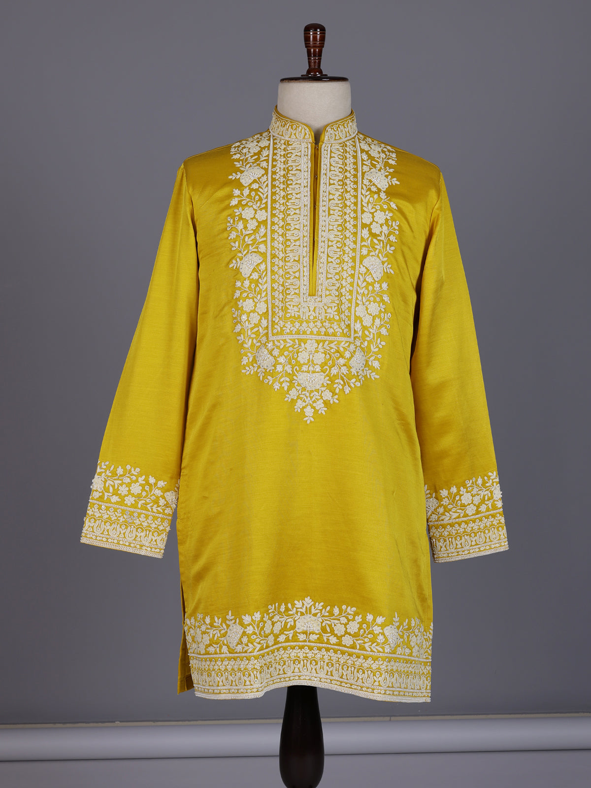Mustard yellow silk kurta suit with ornate embellished yoke
