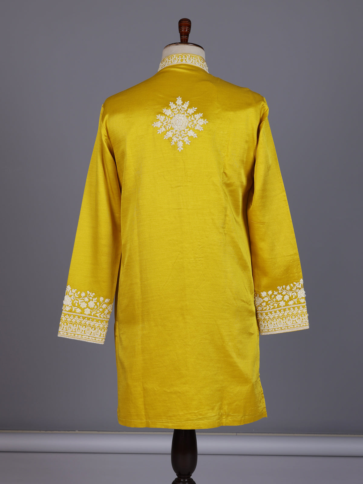 Mustard yellow silk kurta suit with ornate embellished yoke