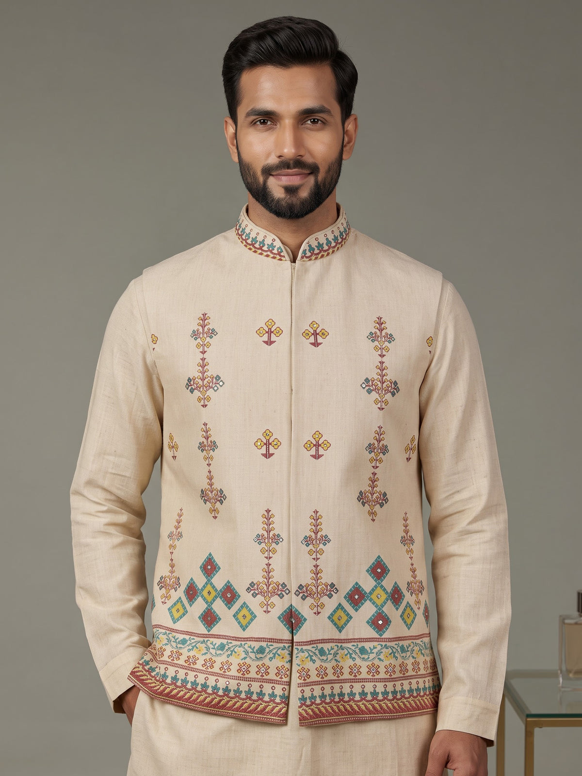 Beige printed silk waistcoat set with multicolor floral embellishments