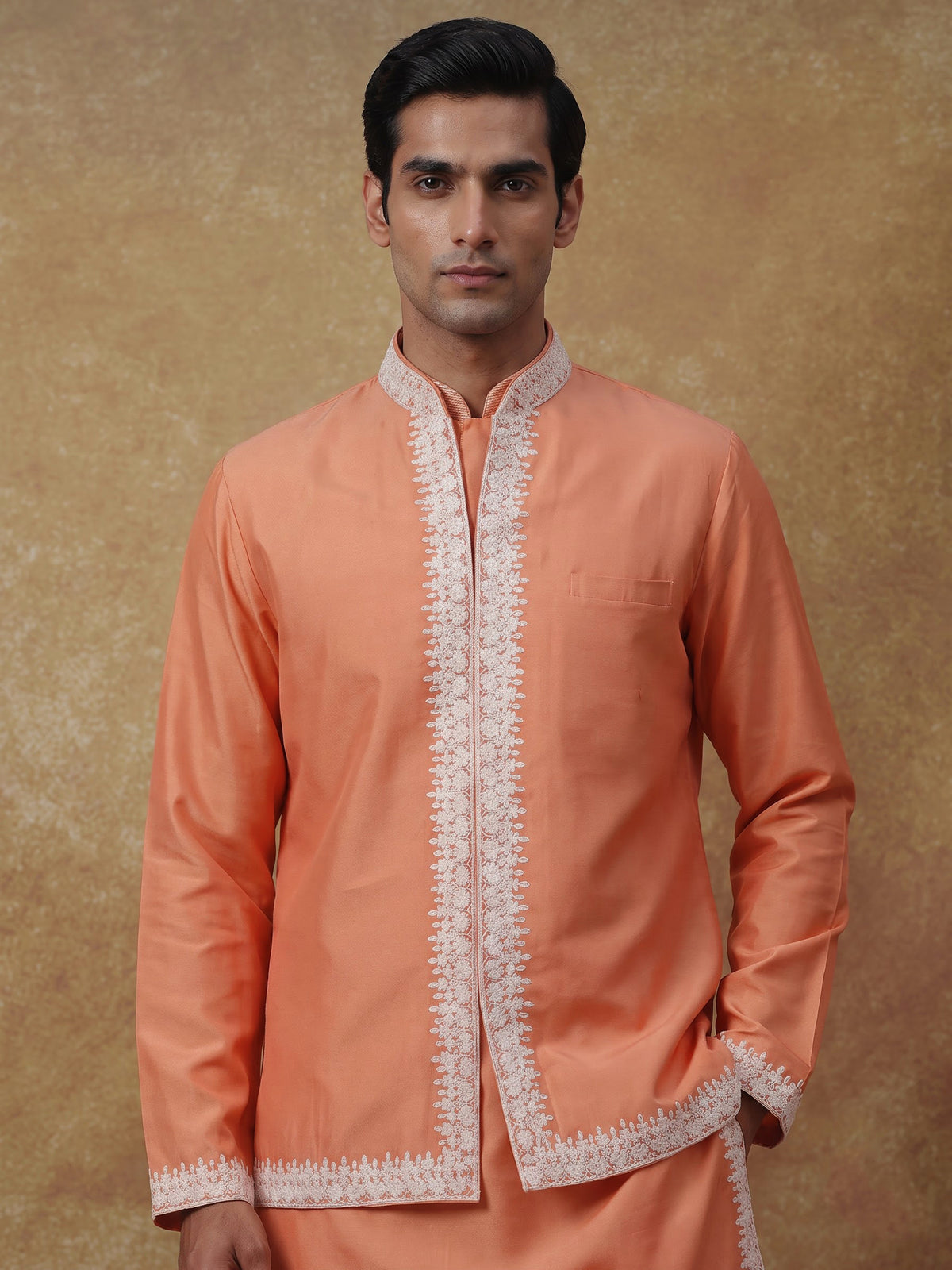 Peach silk blend waistcoat set with cutdana thread detailing