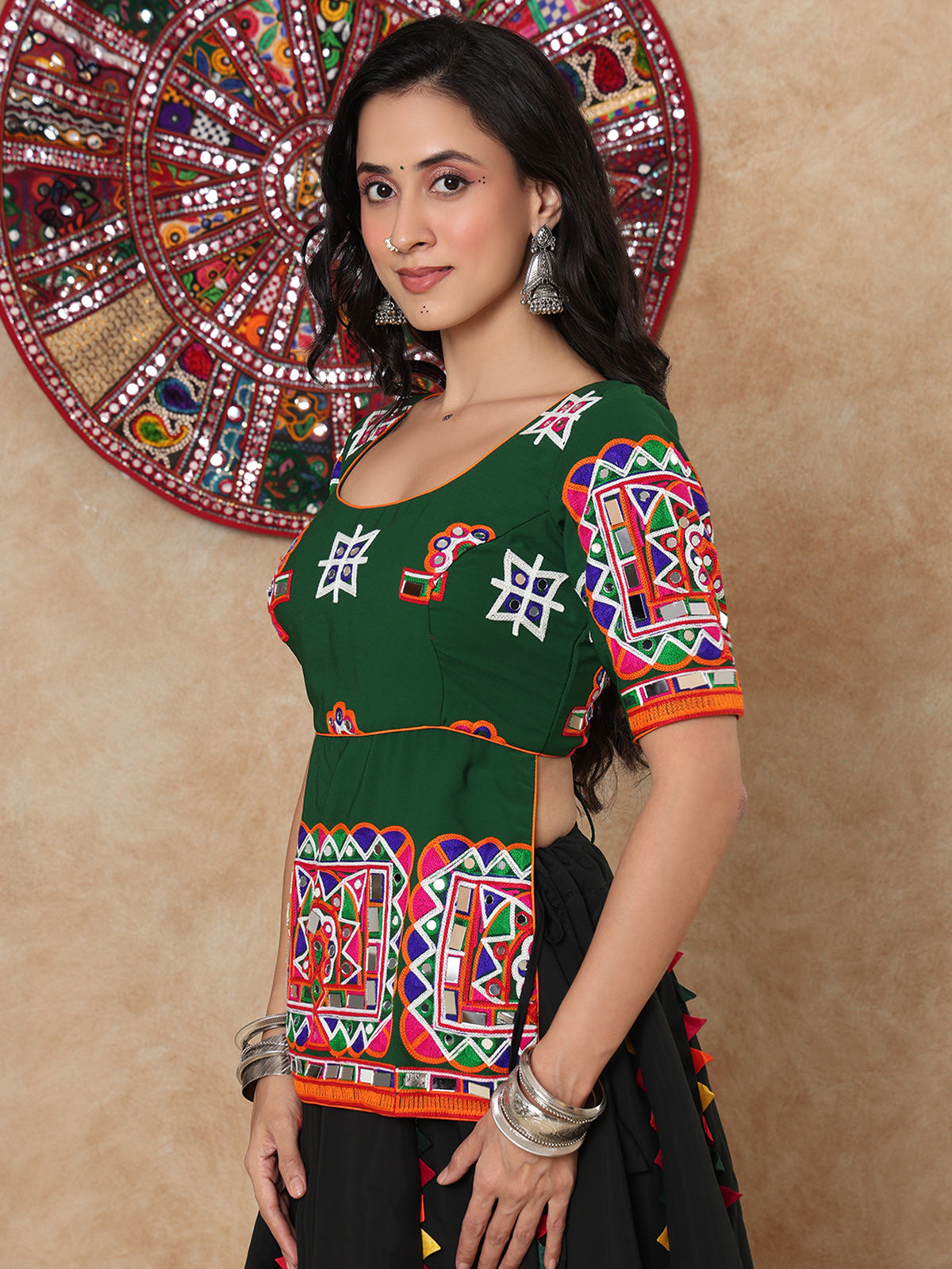 Green thread mirror work round neck elbow sleeve blouse design