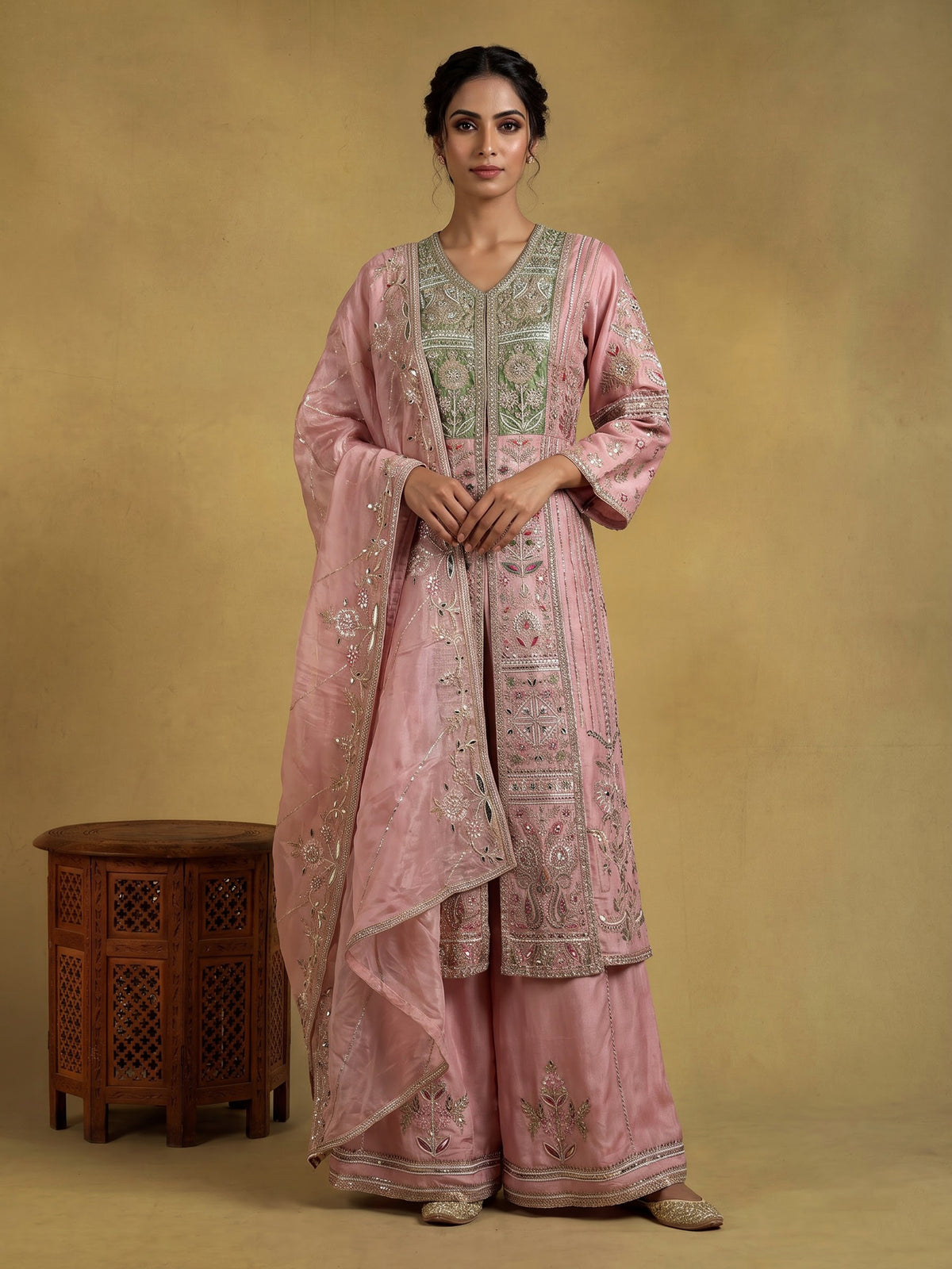 Light pink raw silk pakistani palazzo suit with heavy embellishments