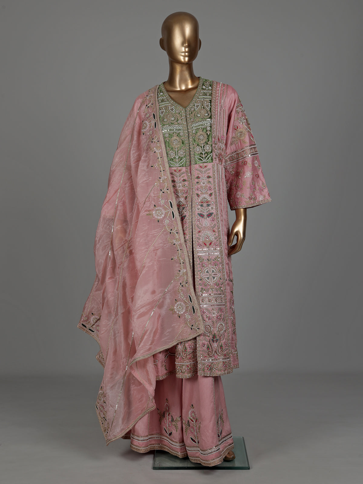 Light pink raw silk pakistani palazzo suit with heavy embellishments