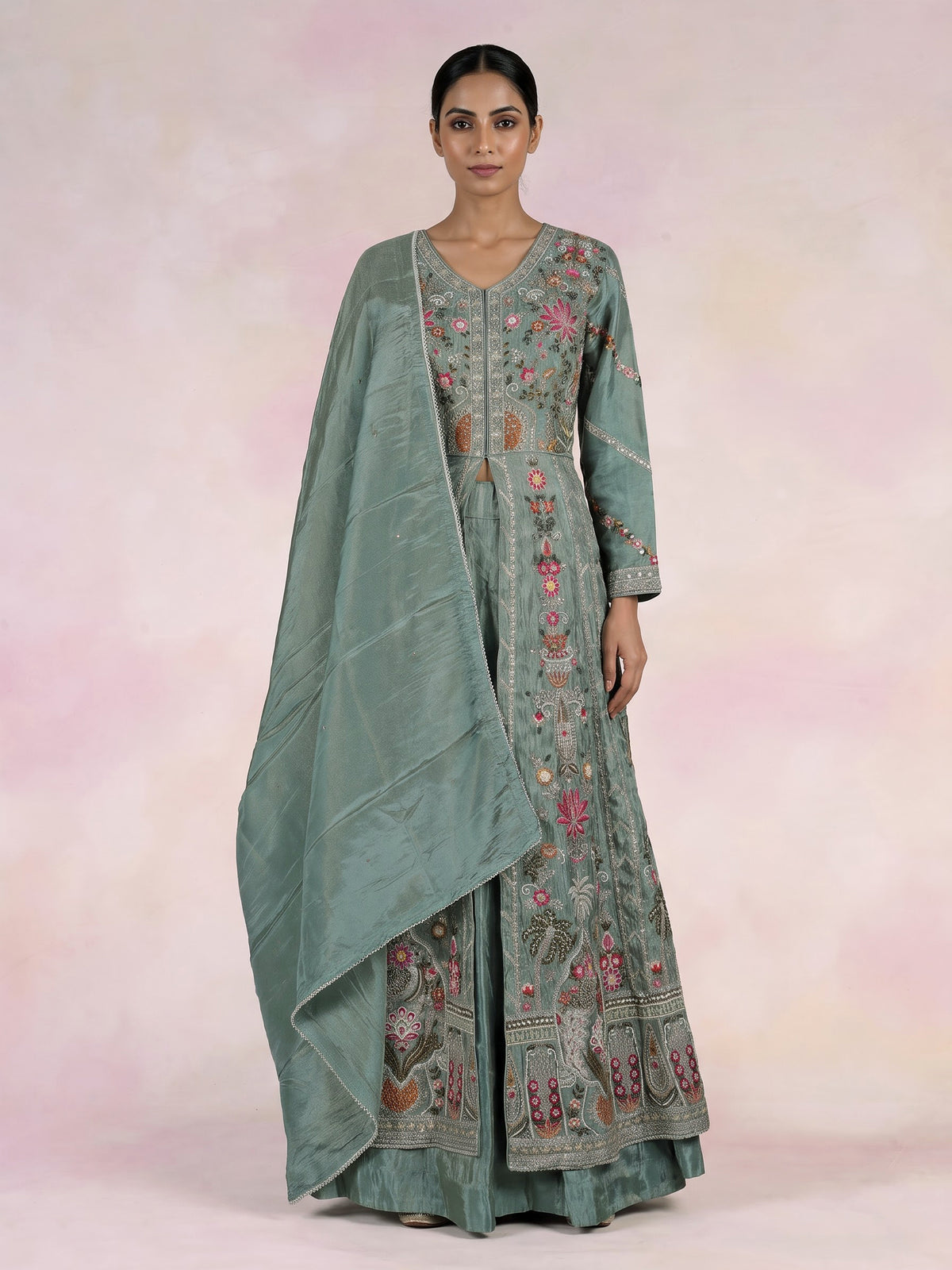 Pastel green silk pakistani anarkali lehenga with embellished dupatta