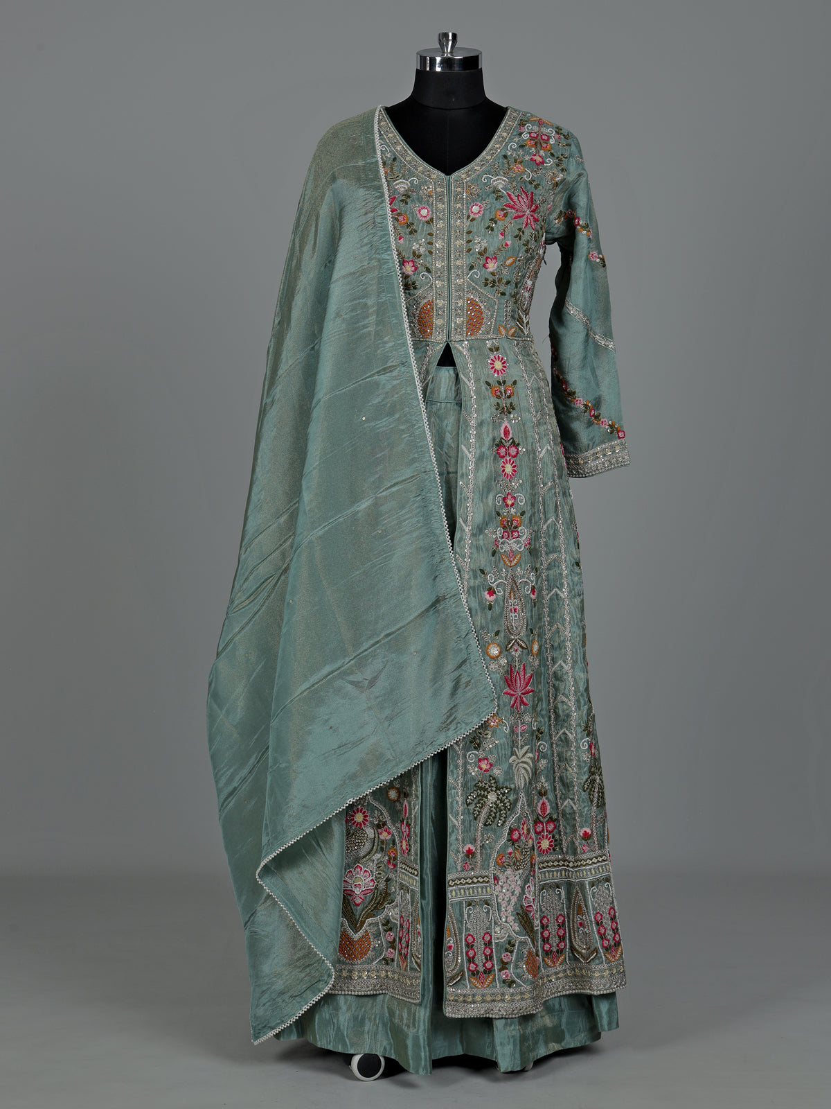 Pastel green silk pakistani anarkali lehenga with embellished dupatta