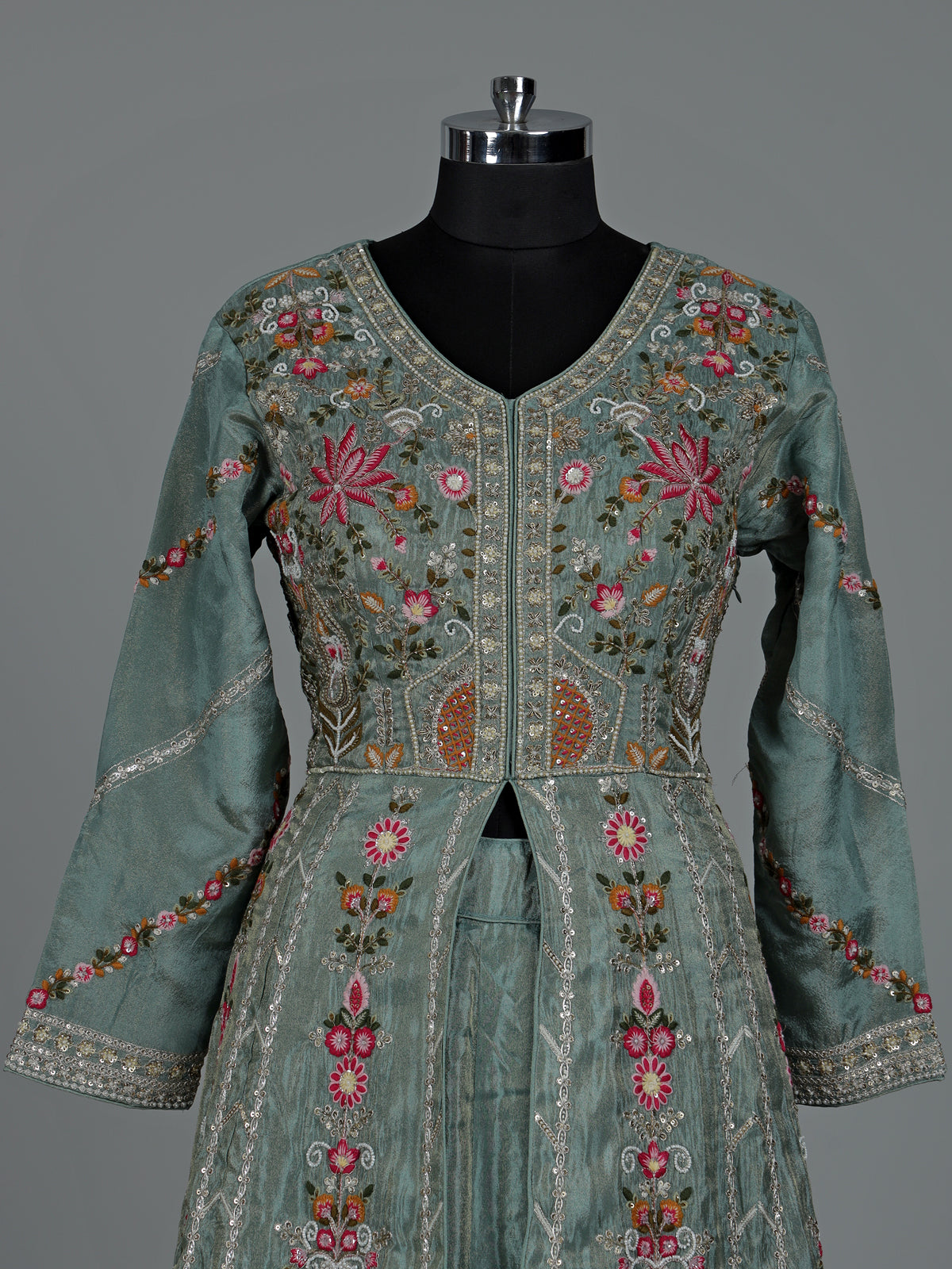 Pastel green silk pakistani anarkali lehenga with embellished dupatta
