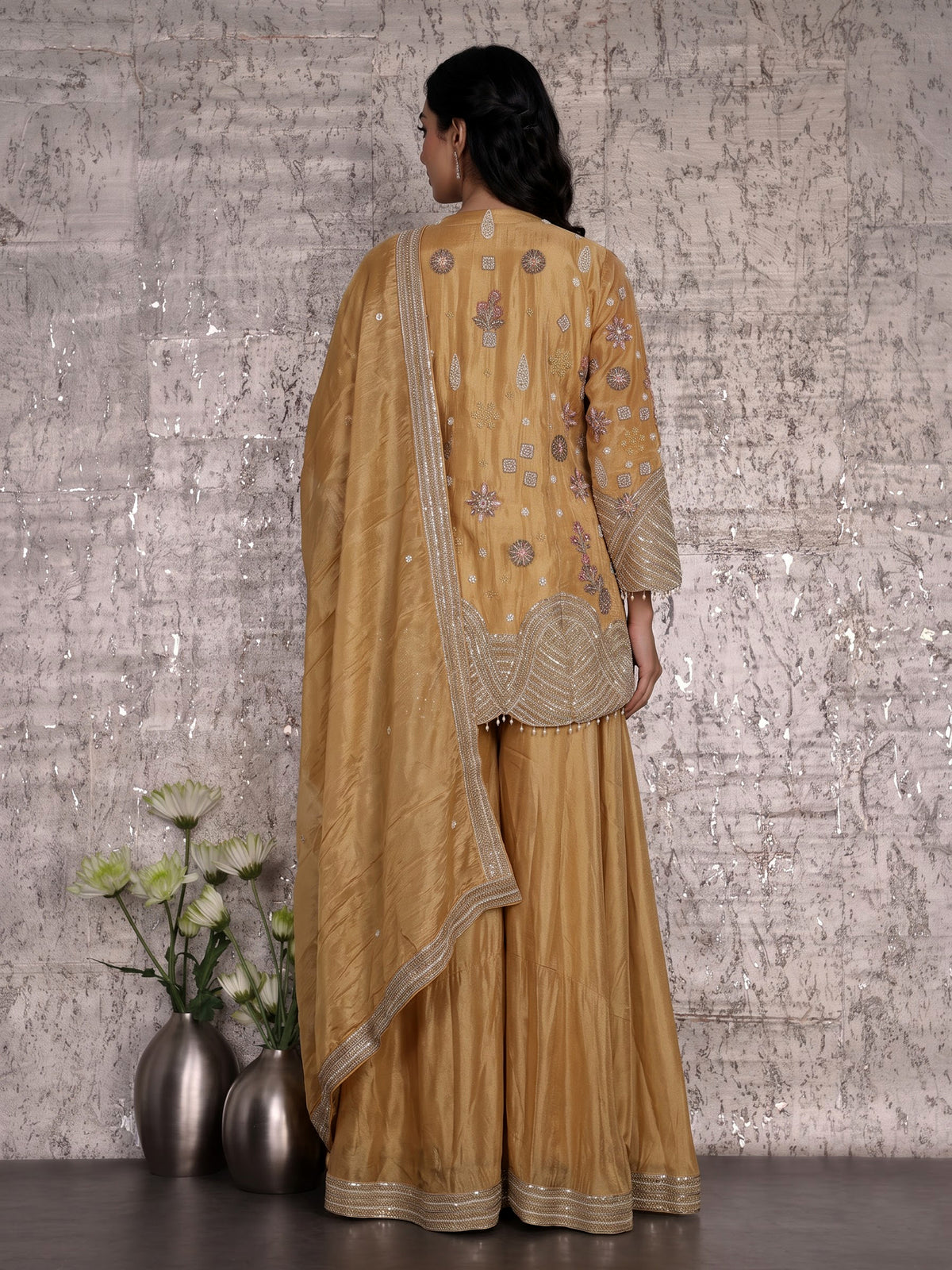 Mustard yellow silk palazzo suit with sequins and tassel detailing