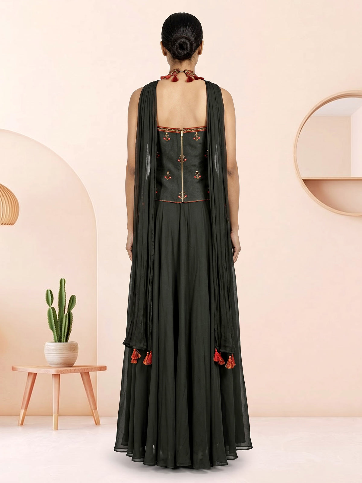 Mehendi green georgette palazzo suit with embroidered tassel detailing