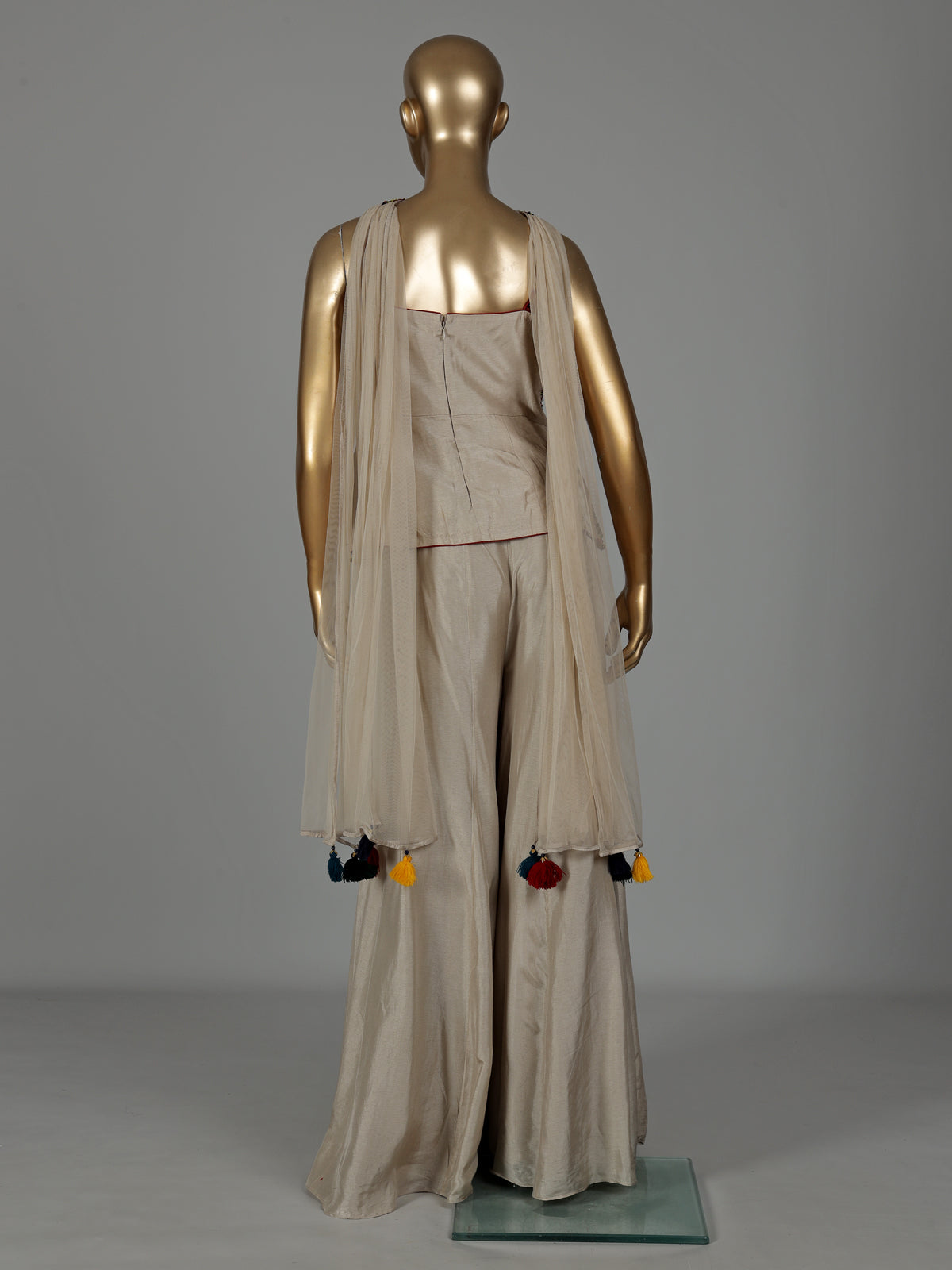Beige silk designer palazzo suit with coin tassel detailing