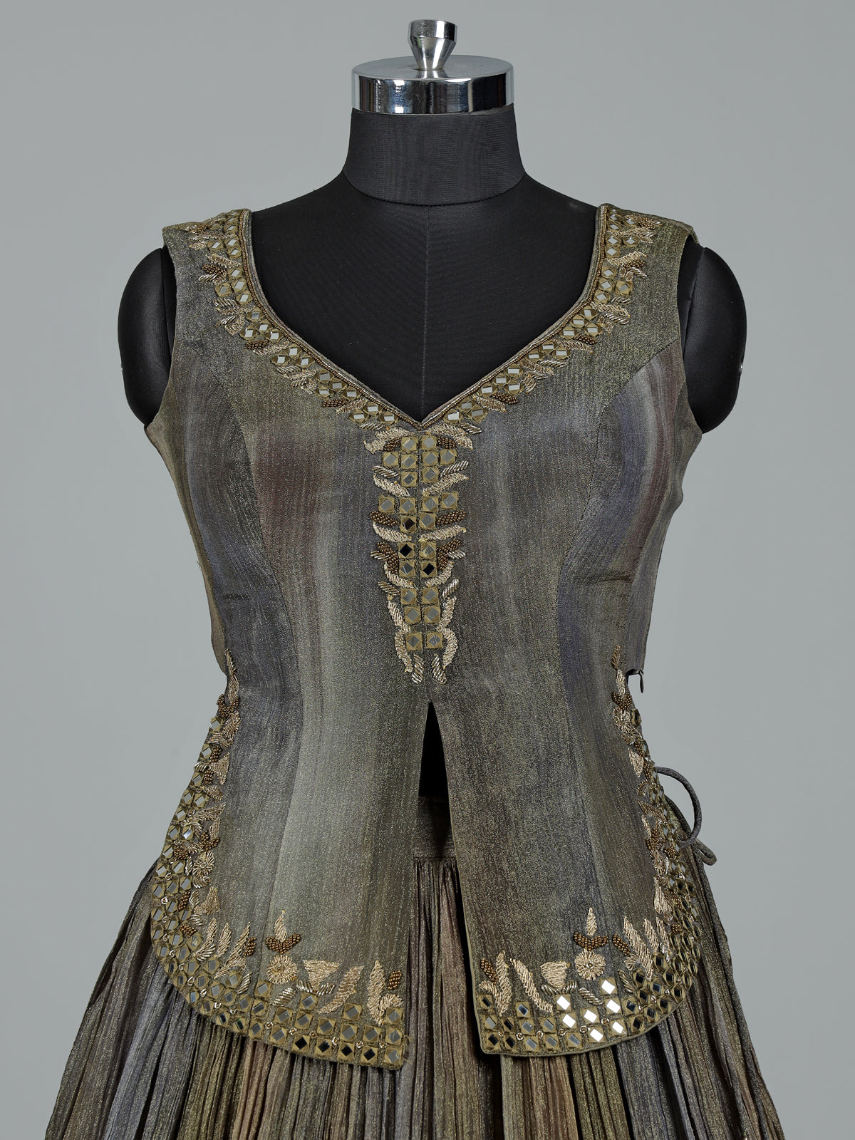 Mehendi green shaded silk lehenga choli with ornate embellishments