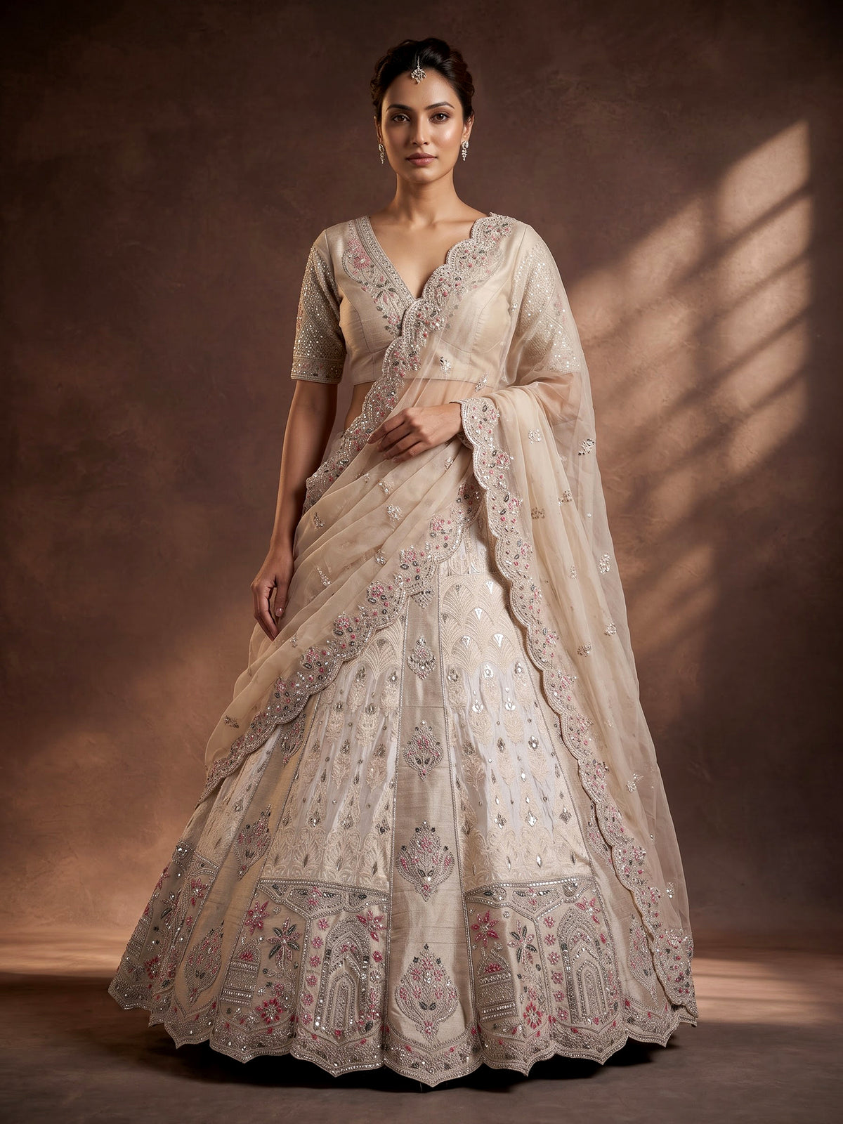 Cream silk unstitched lehenga choli with jharokha panels