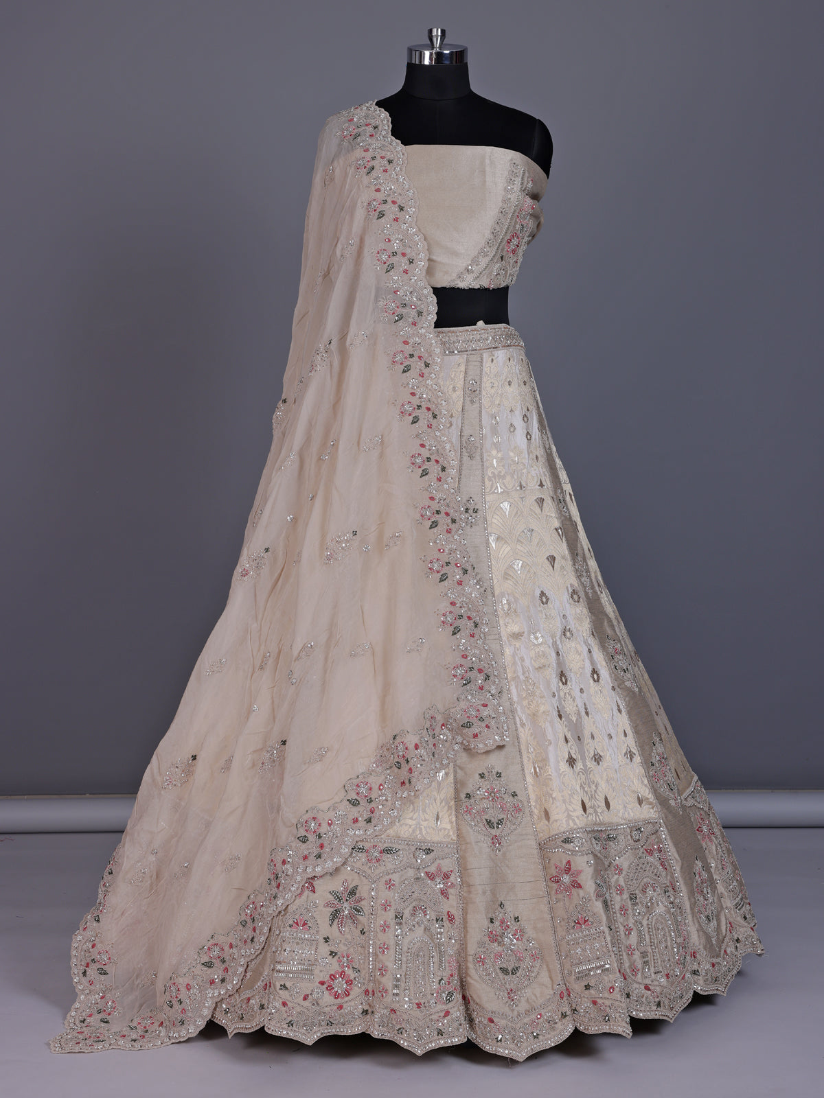 Cream silk unstitched lehenga choli with jharokha panels