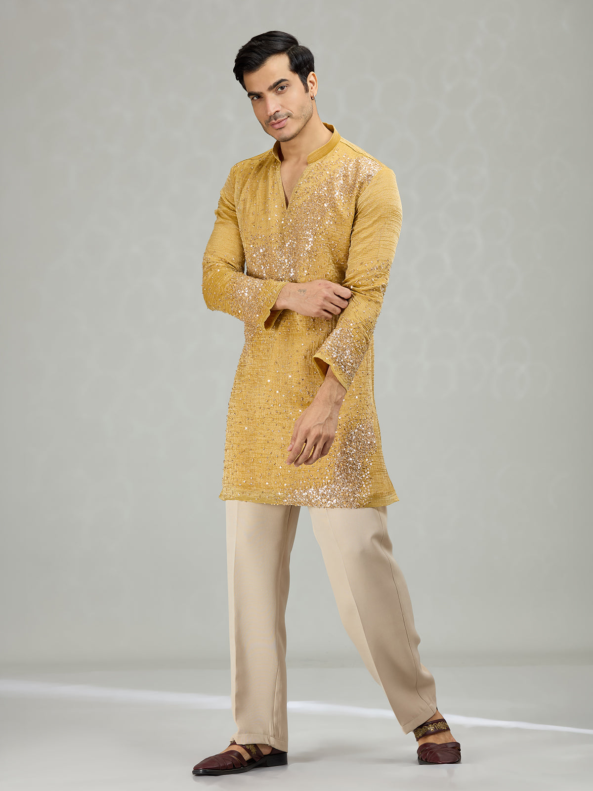 Yellow radiant wave ornamentation men kurta suit