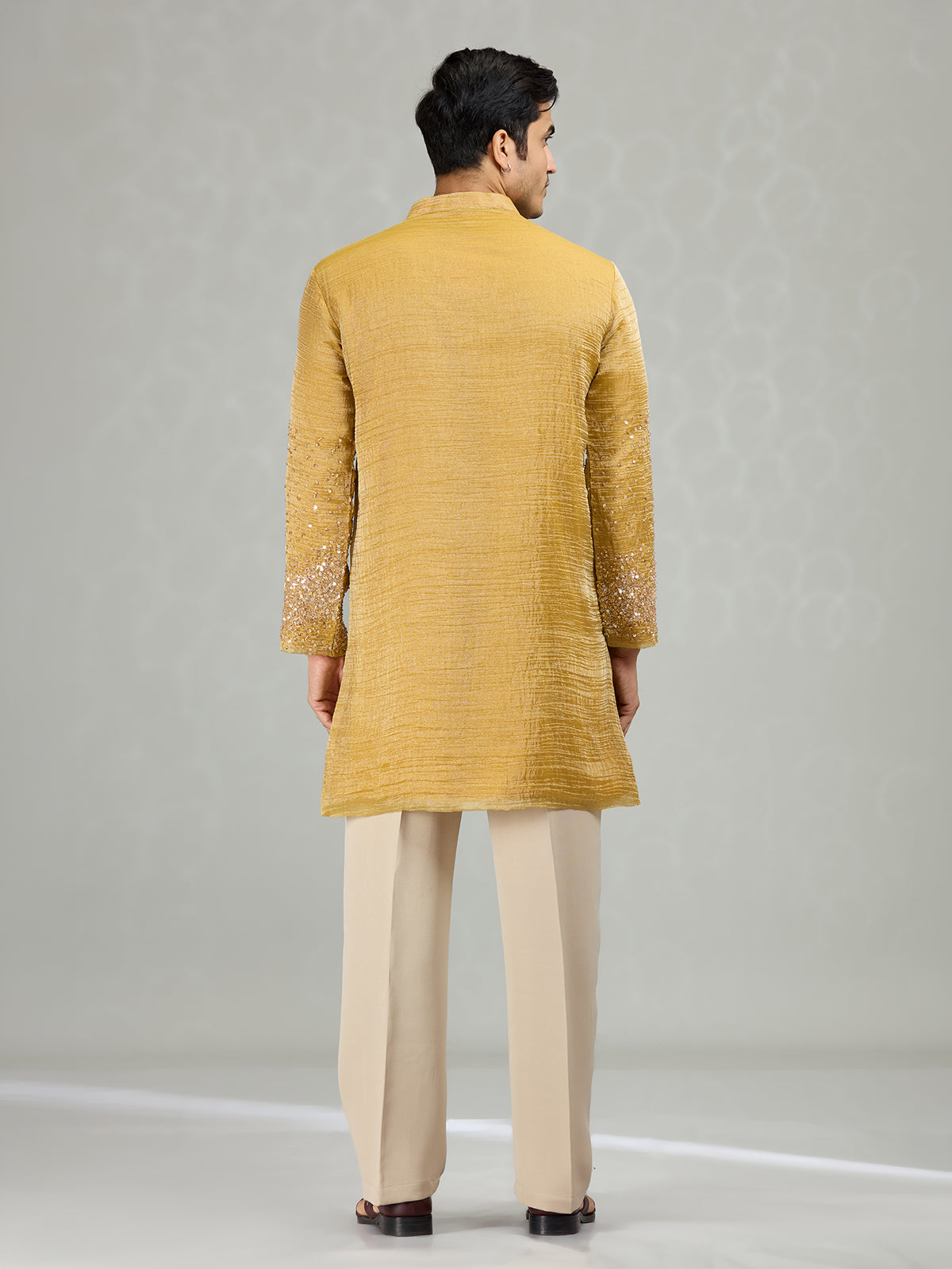 Yellow radiant wave ornamentation men kurta suit