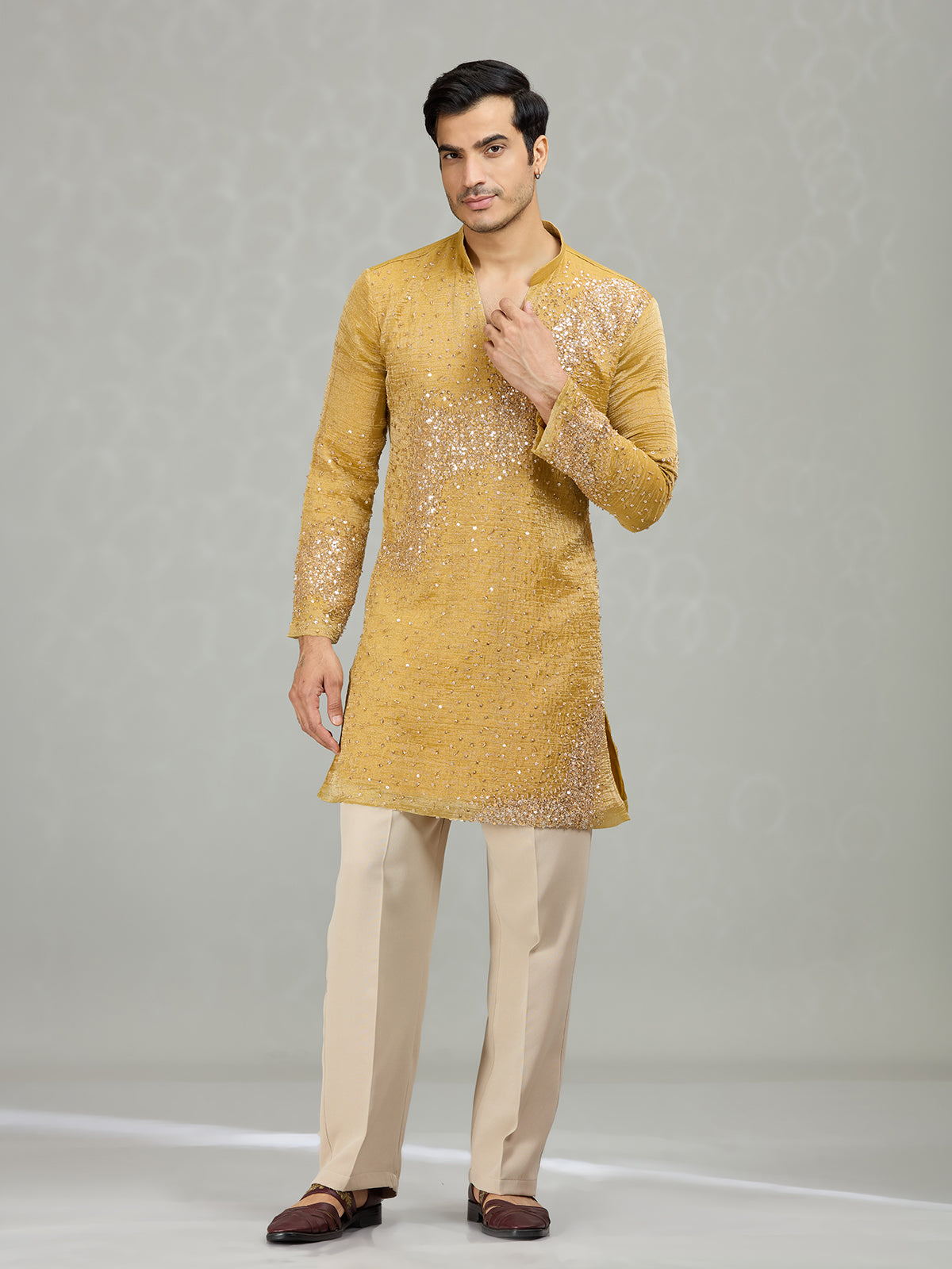 Yellow radiant wave ornamentation men kurta suit