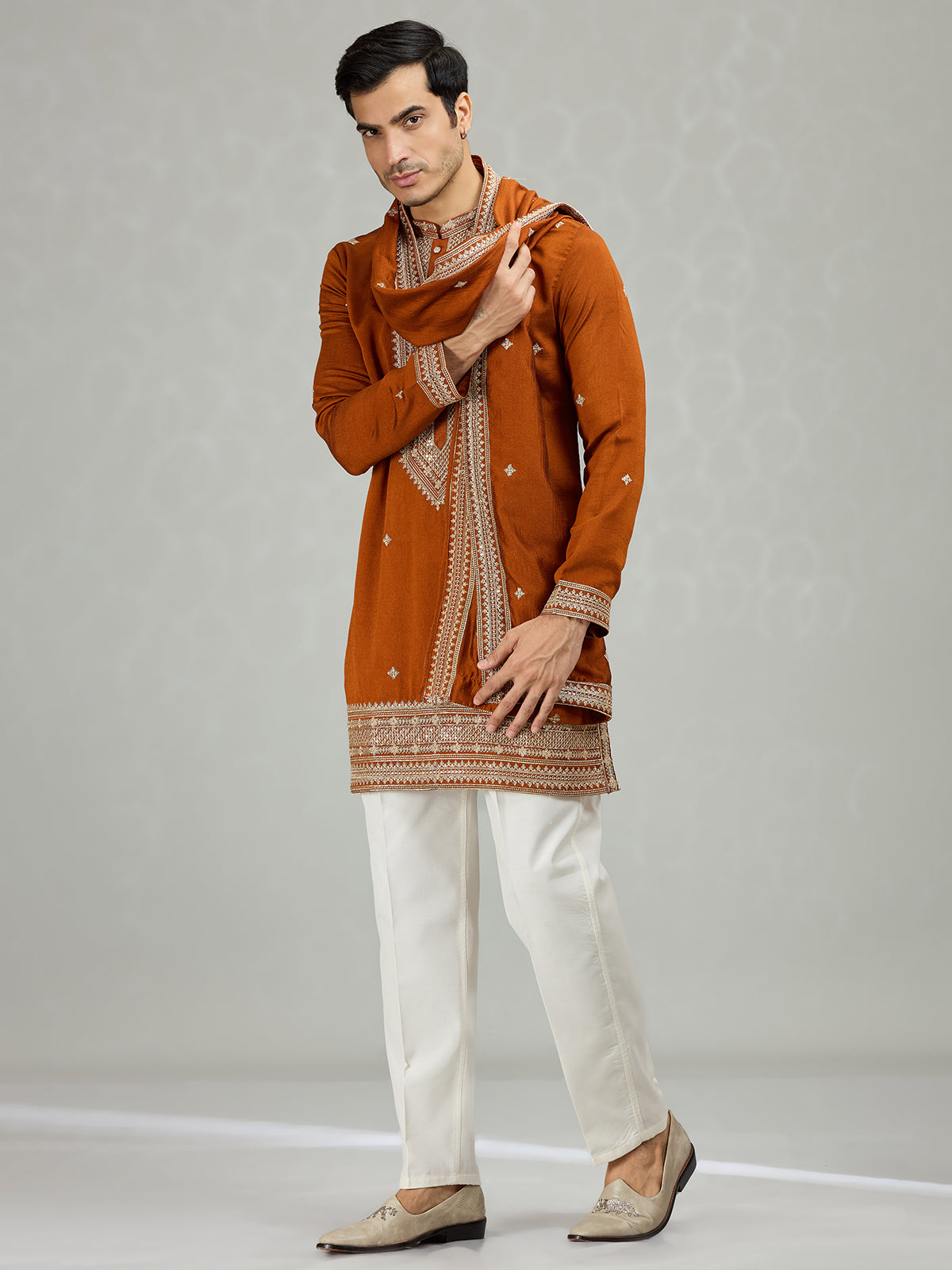 Rust orange statement embroidered men kurta suit