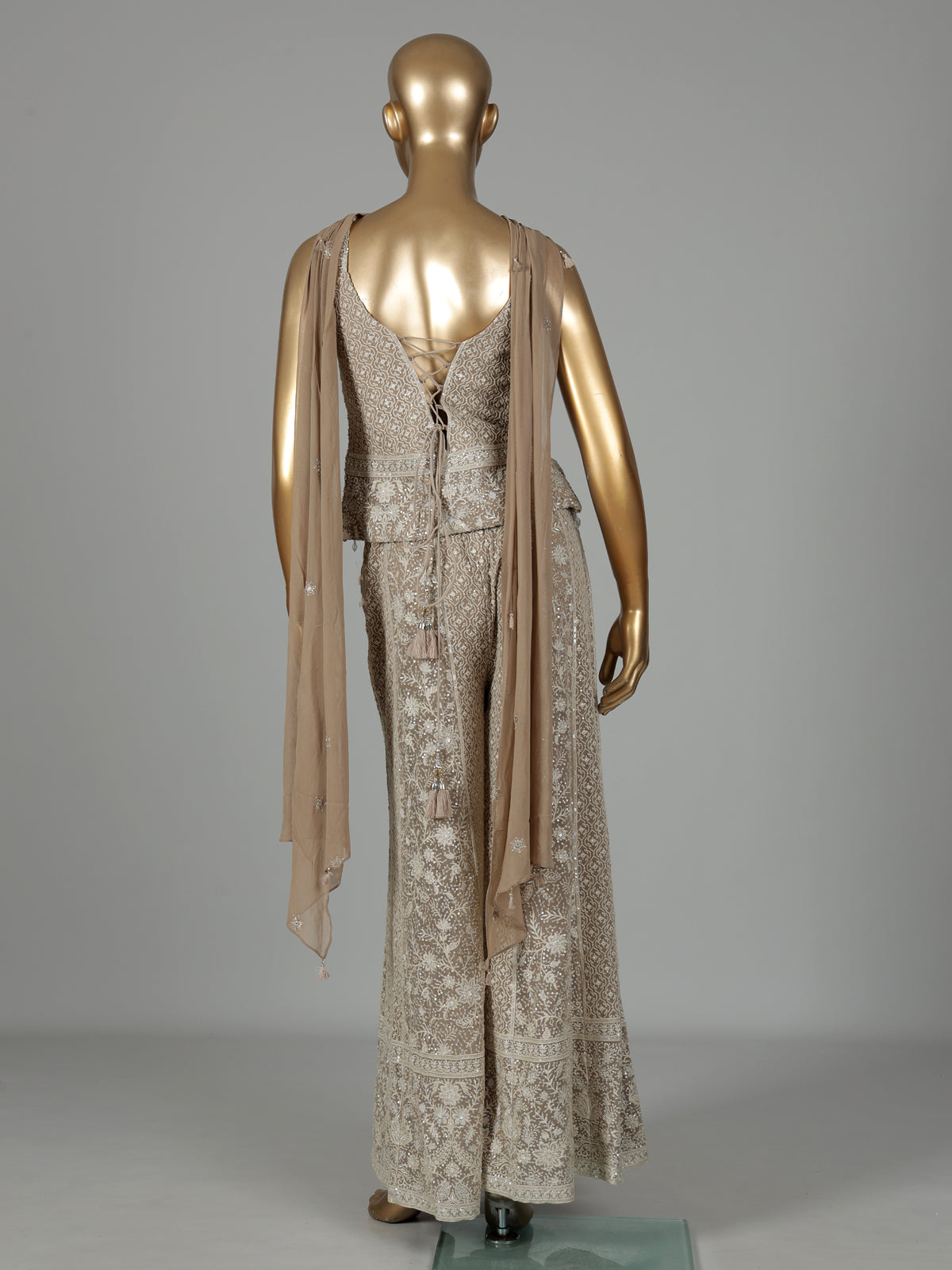 Beige georgette pakistani salwar suit with sparkling mirror embellishments
