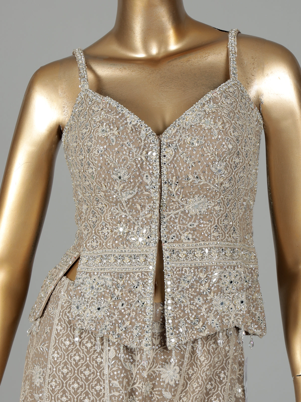 Beige georgette pakistani salwar suit with sparkling mirror embellishments
