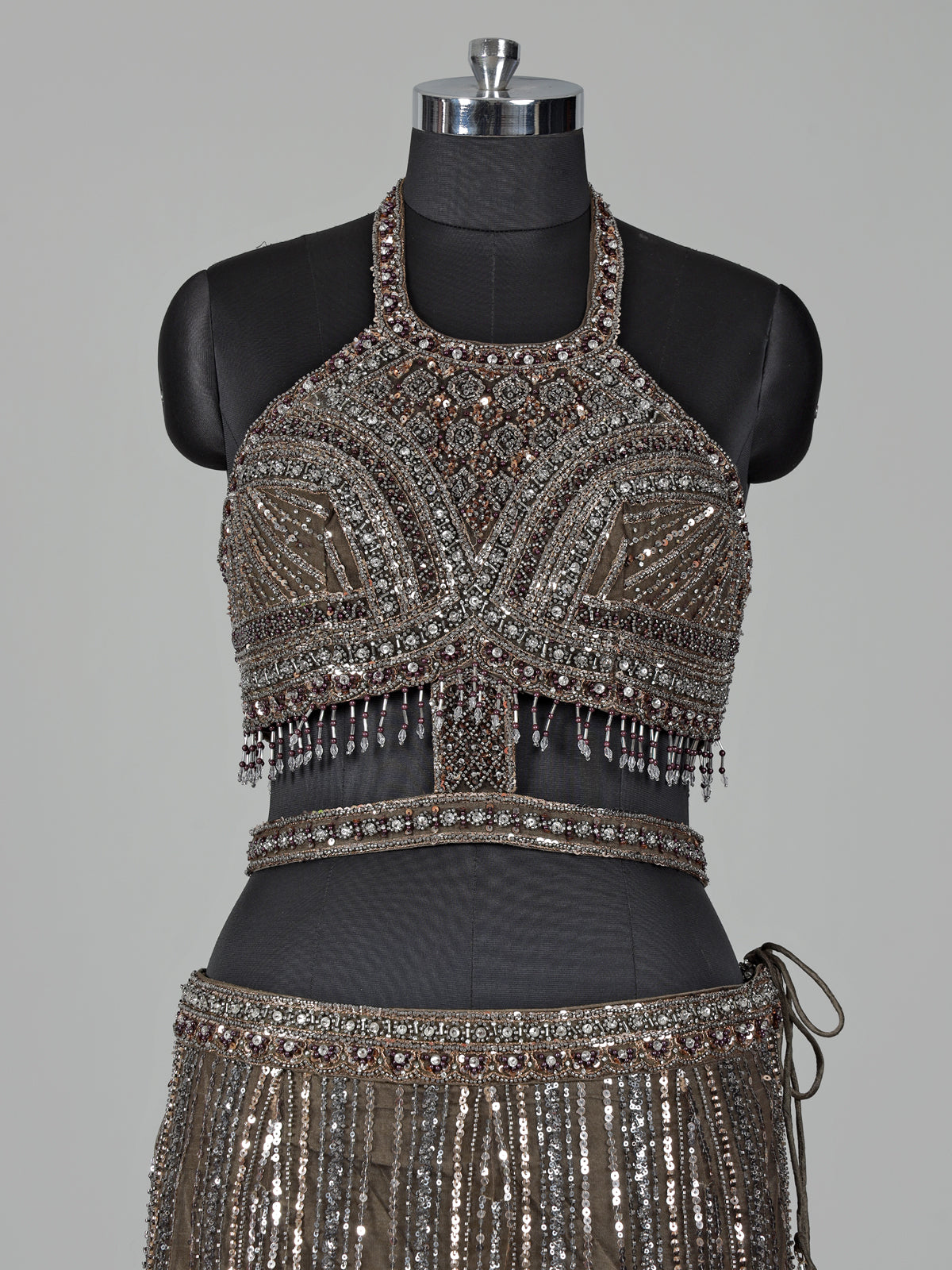 Dark mehendi green silk lehenga choli with diamond embellishments