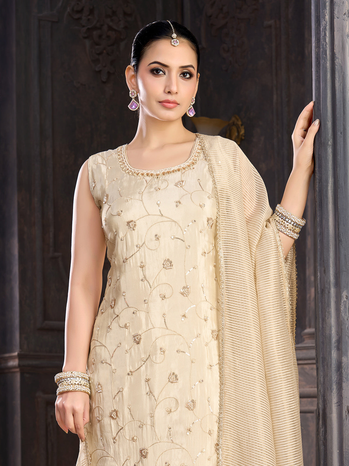 Cream silk salwar suit with embroidered work and zari dupatta
