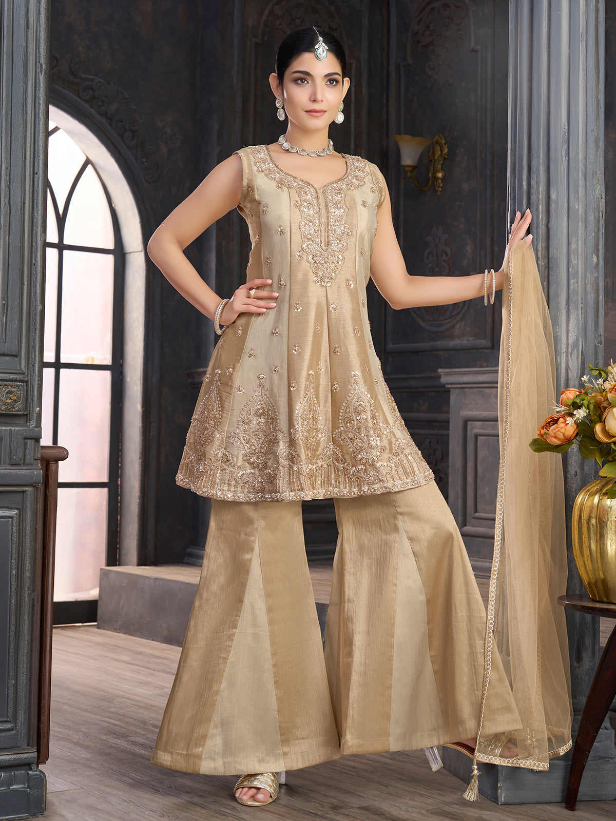 Gold silk palazzo salwar suit with cutdana and sequin beadwork