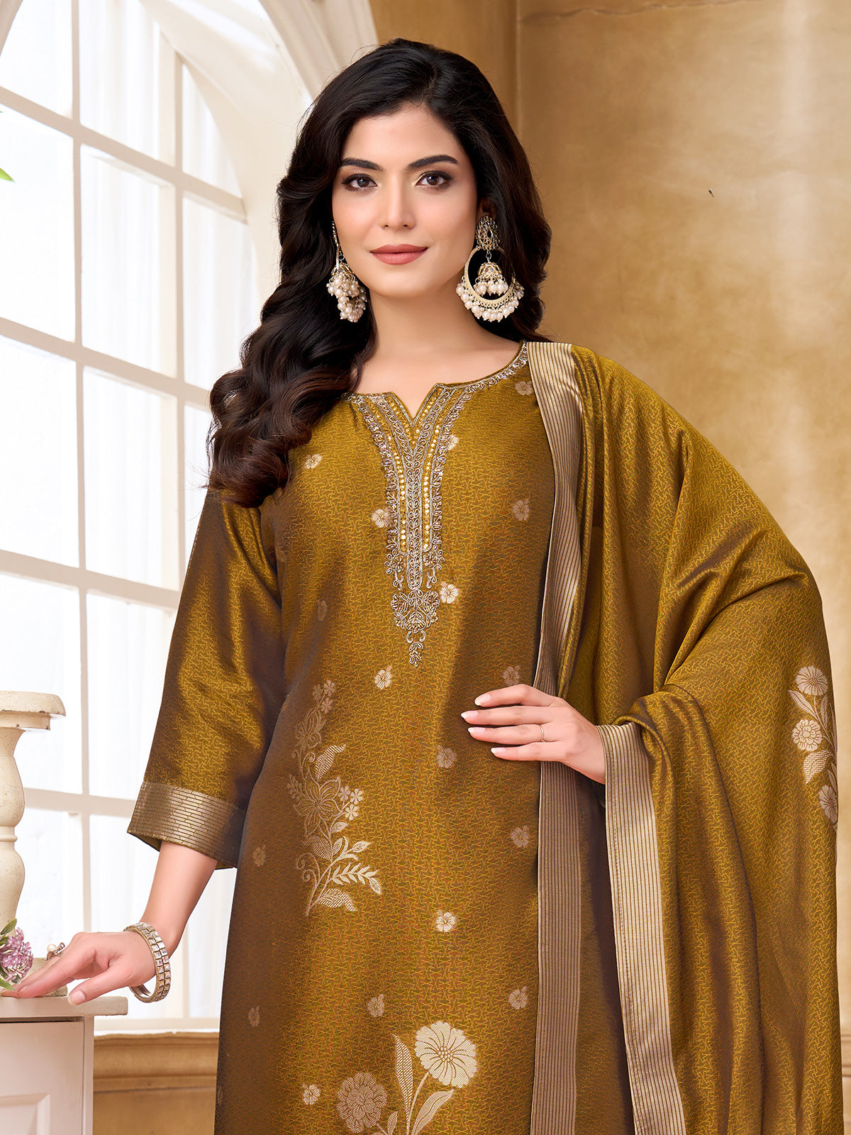 Mehendi green silk salwar suit with intricate zardosi and embroidery