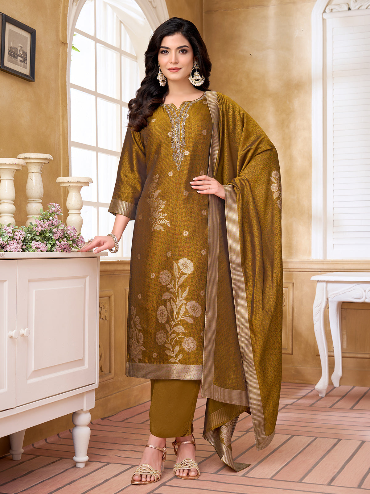 Mehendi green silk salwar suit with intricate zardosi and embroidery