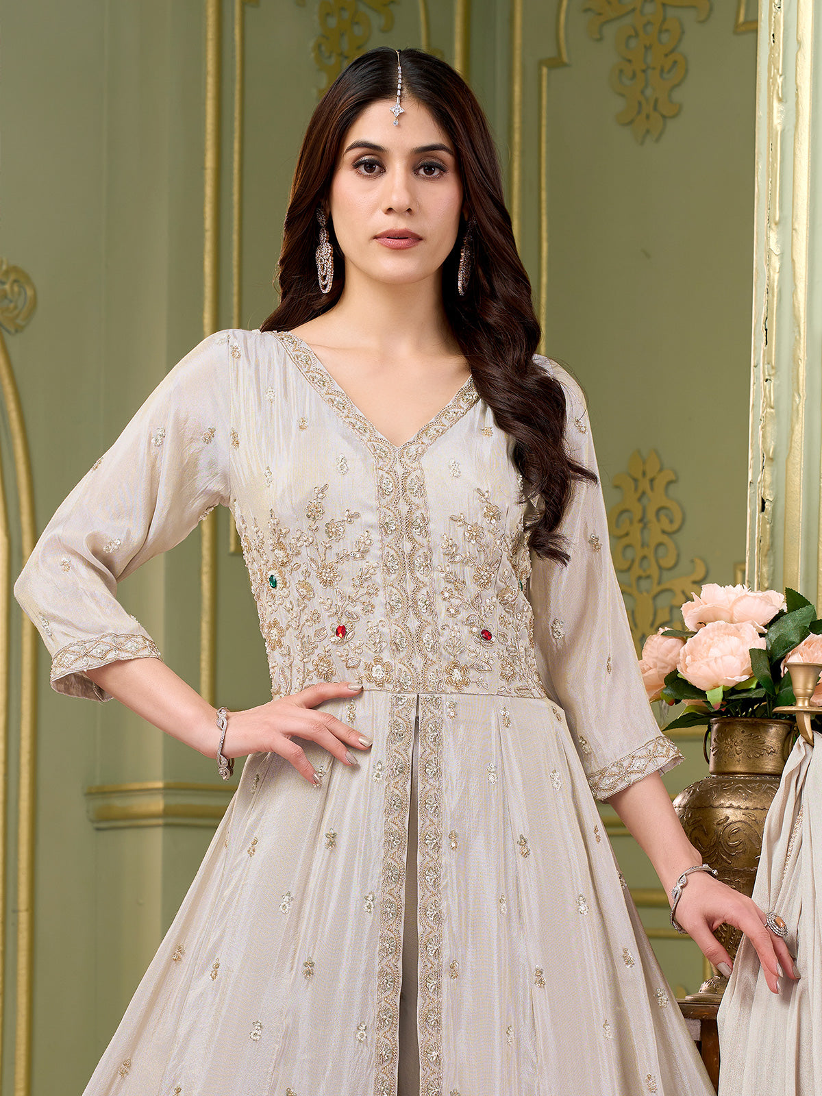 Cream silk anarkali salwar suit with embroidered butti work