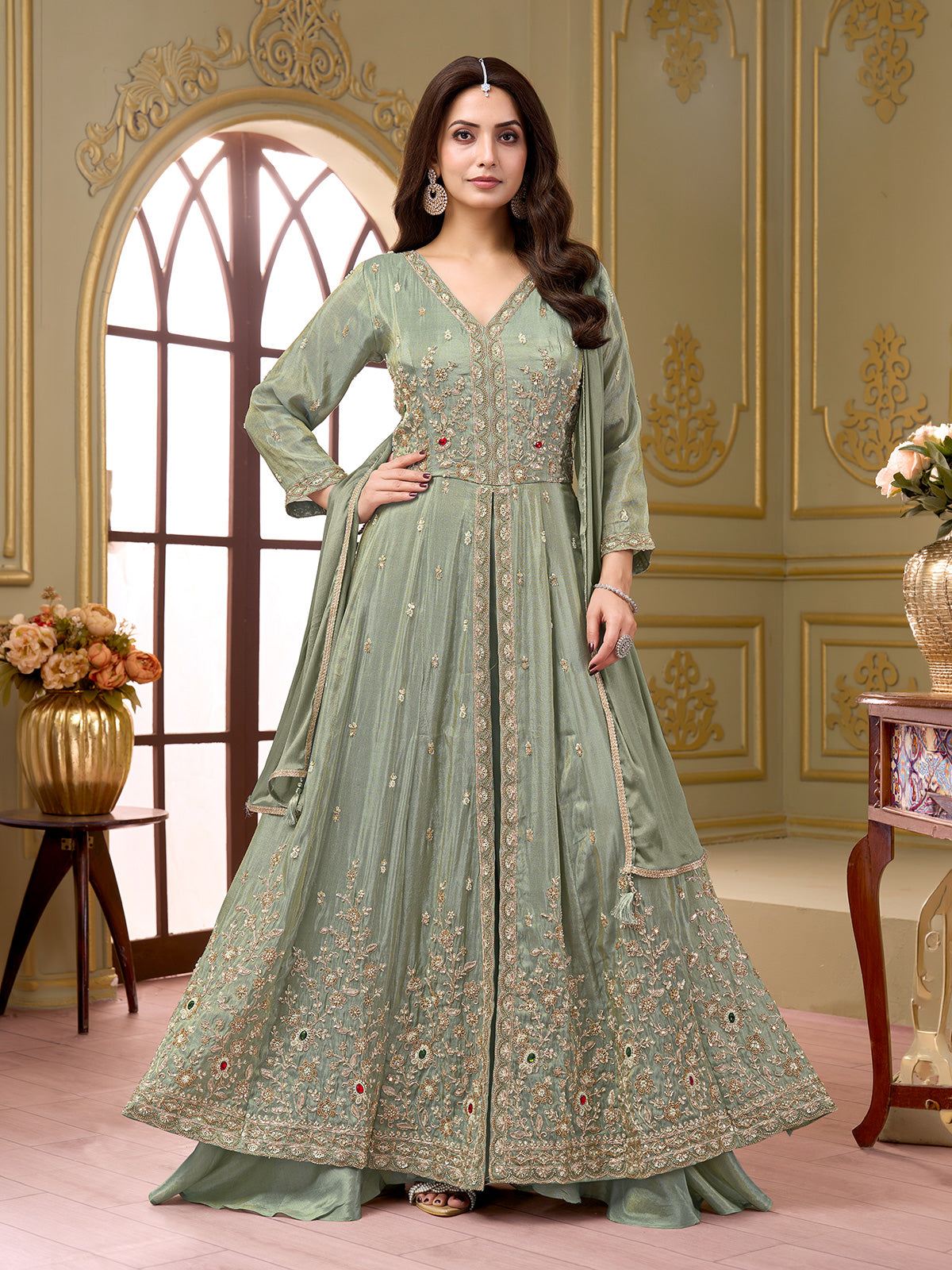 Pastel pista green silk anarkali palazzo suit with diamond embellishments