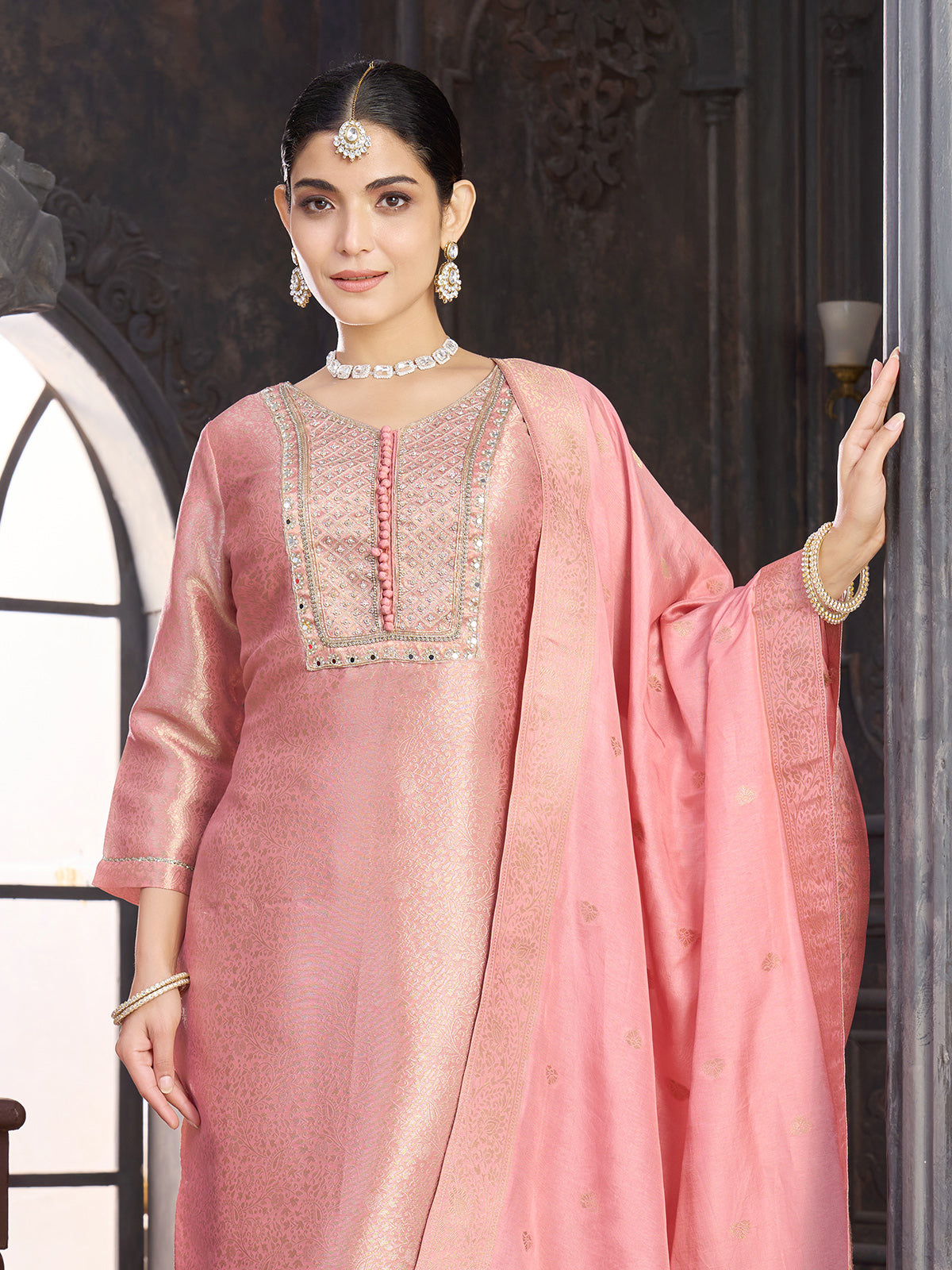 Pastel pink brocade silk salwar suit with mirror work yoke