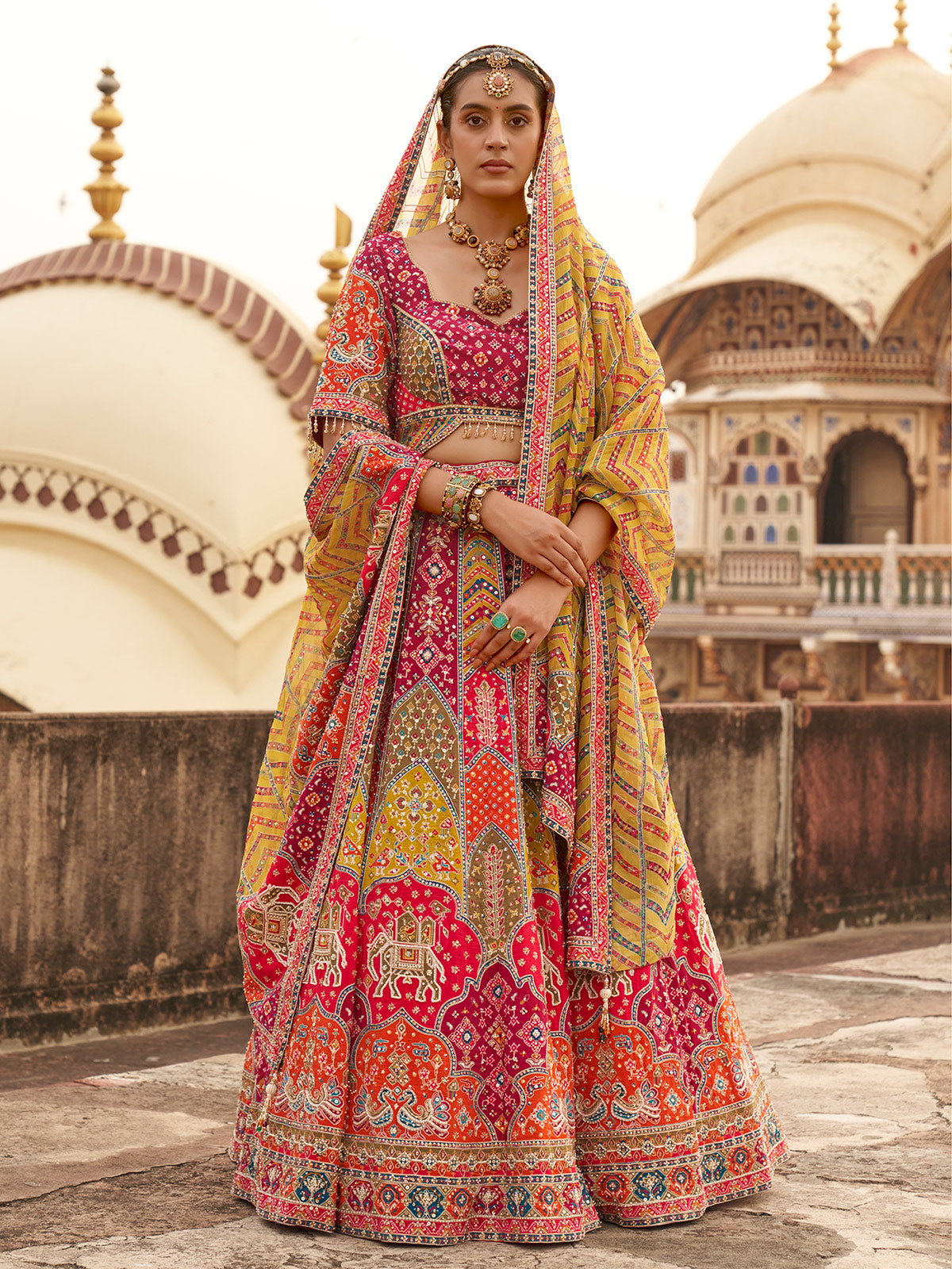 Yellow royal elephant motif women bridal lehenga choli