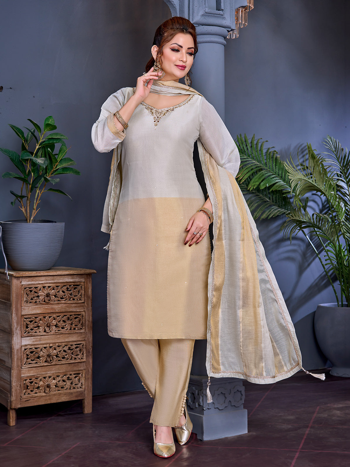 Gold and white shimmer salwar suit with aabla detailing