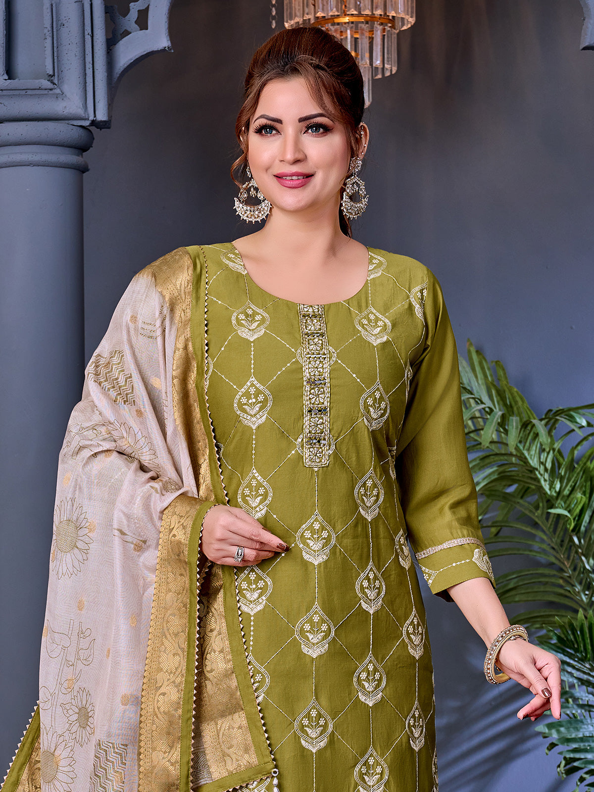 Mehendi green soft silk salwar suit with mirror accents