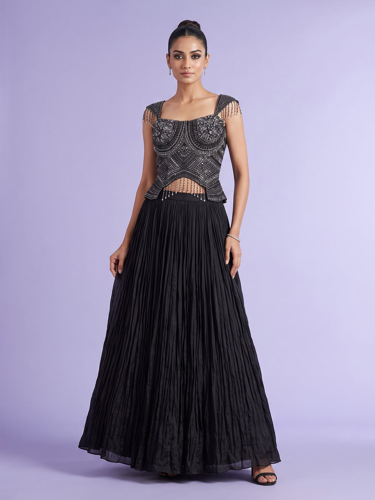 Black chiffon silk lehenga choli with diamond and cutdana embellishments