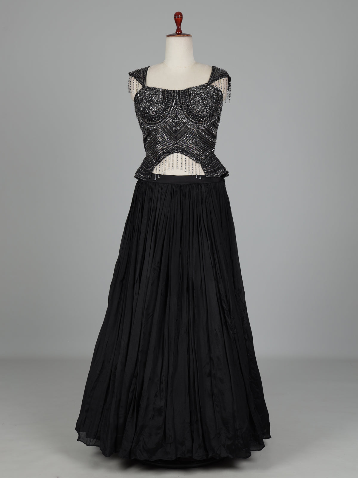 Black chiffon silk lehenga choli with diamond and cutdana embellishments