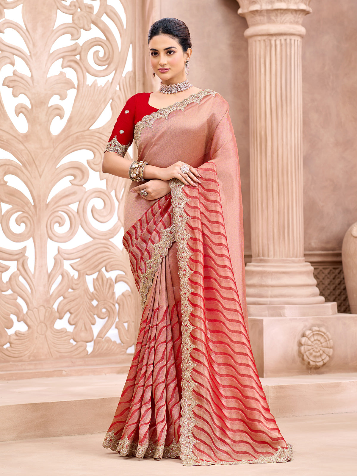 Pastel peach mughal arch embroidered women saree