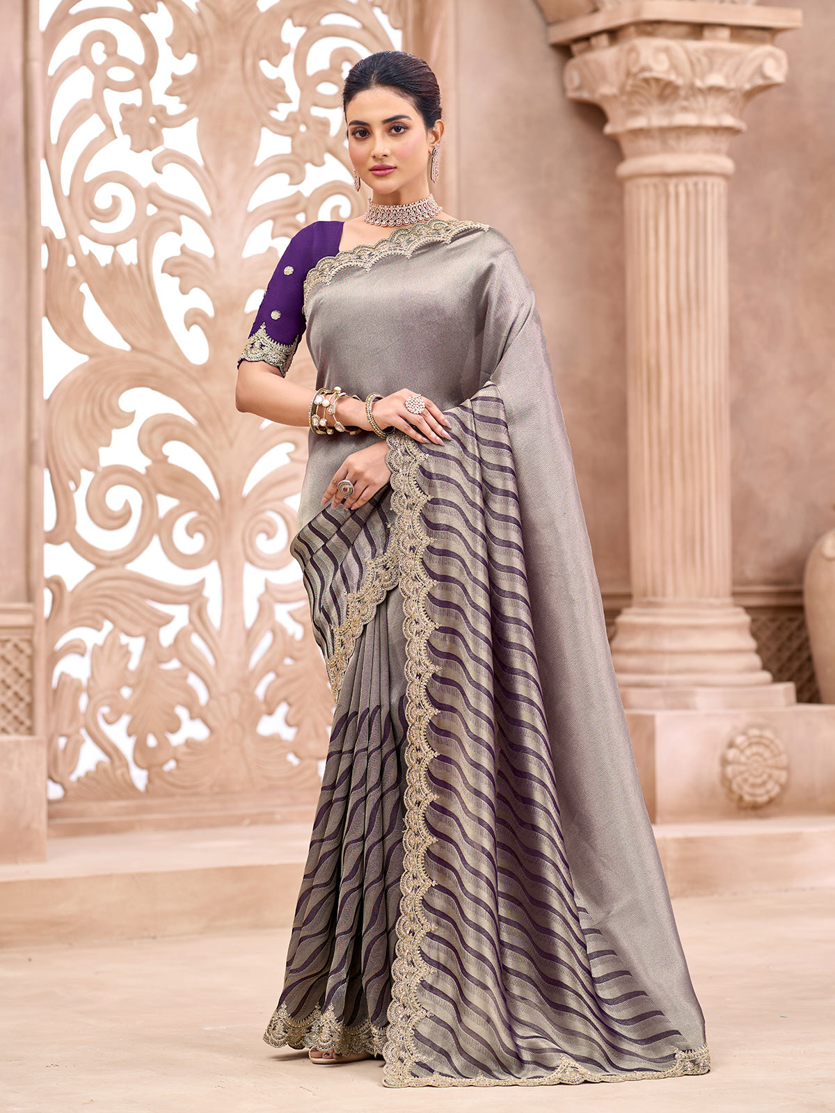 Pastel purple ornate wave border women saree