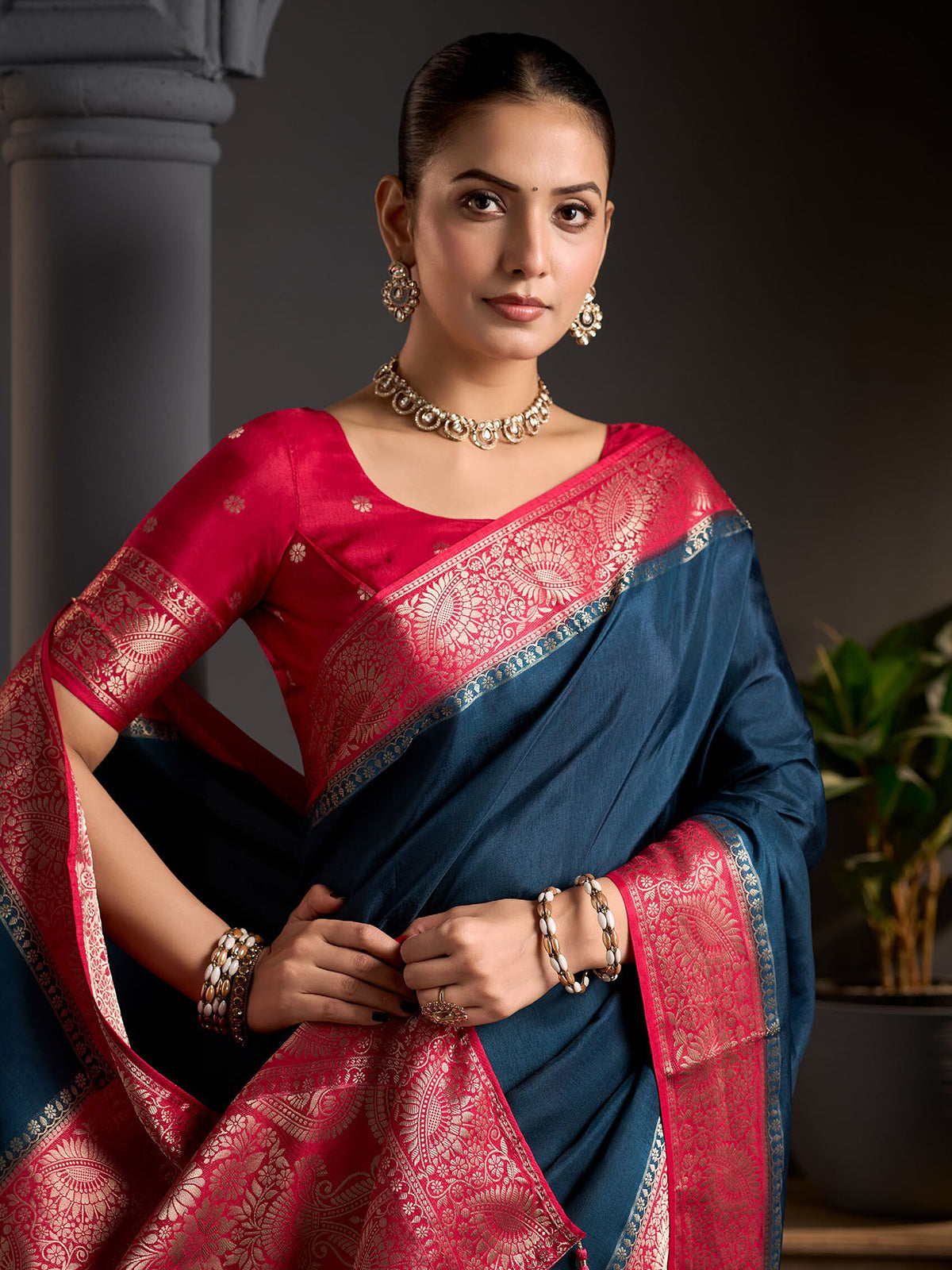 Deep peacock blue floral zari women saree