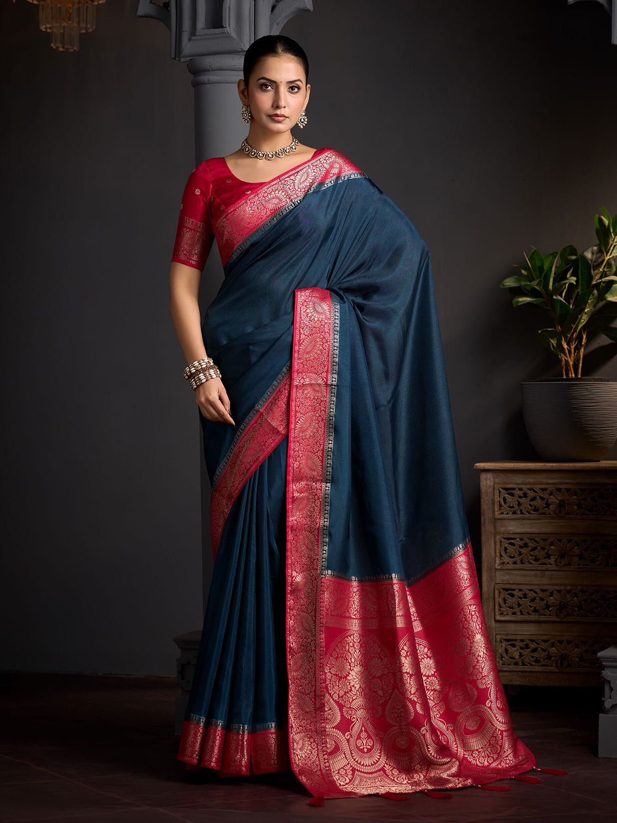 Deep peacock blue floral zari women saree