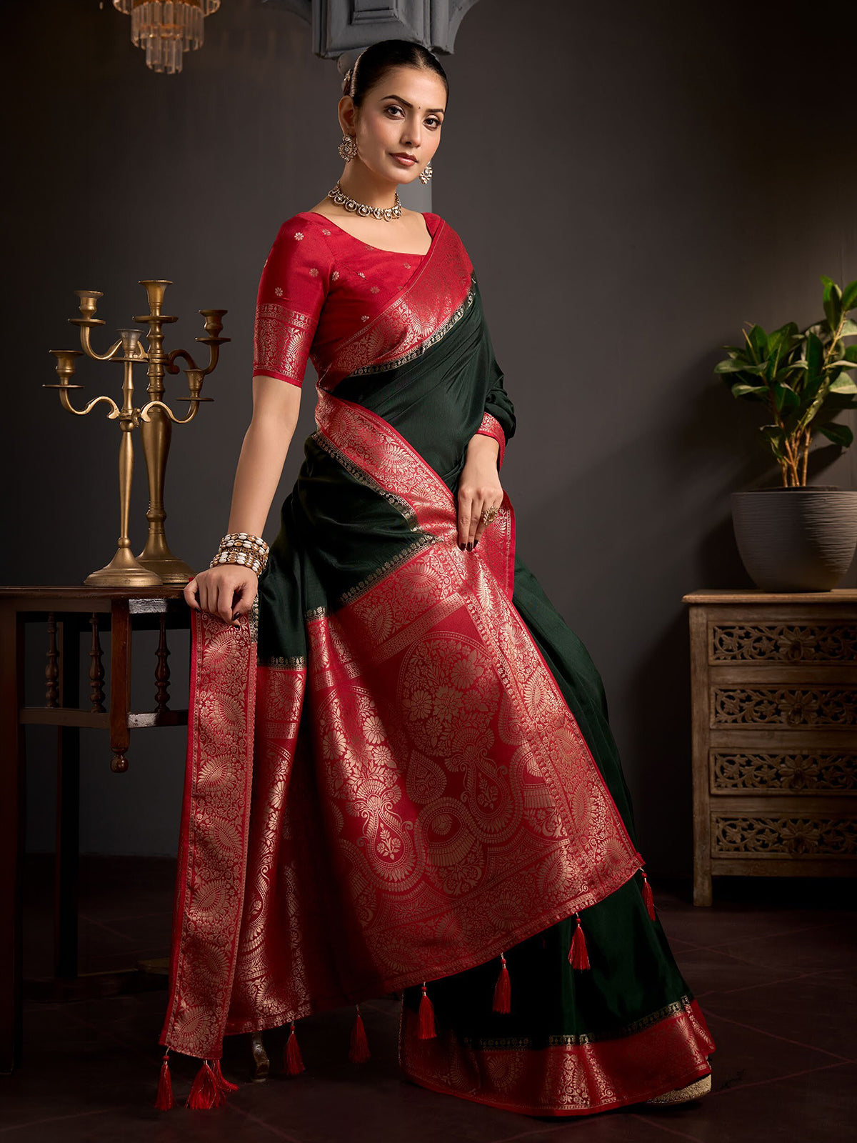 Deep green ornamental paisley women saree
