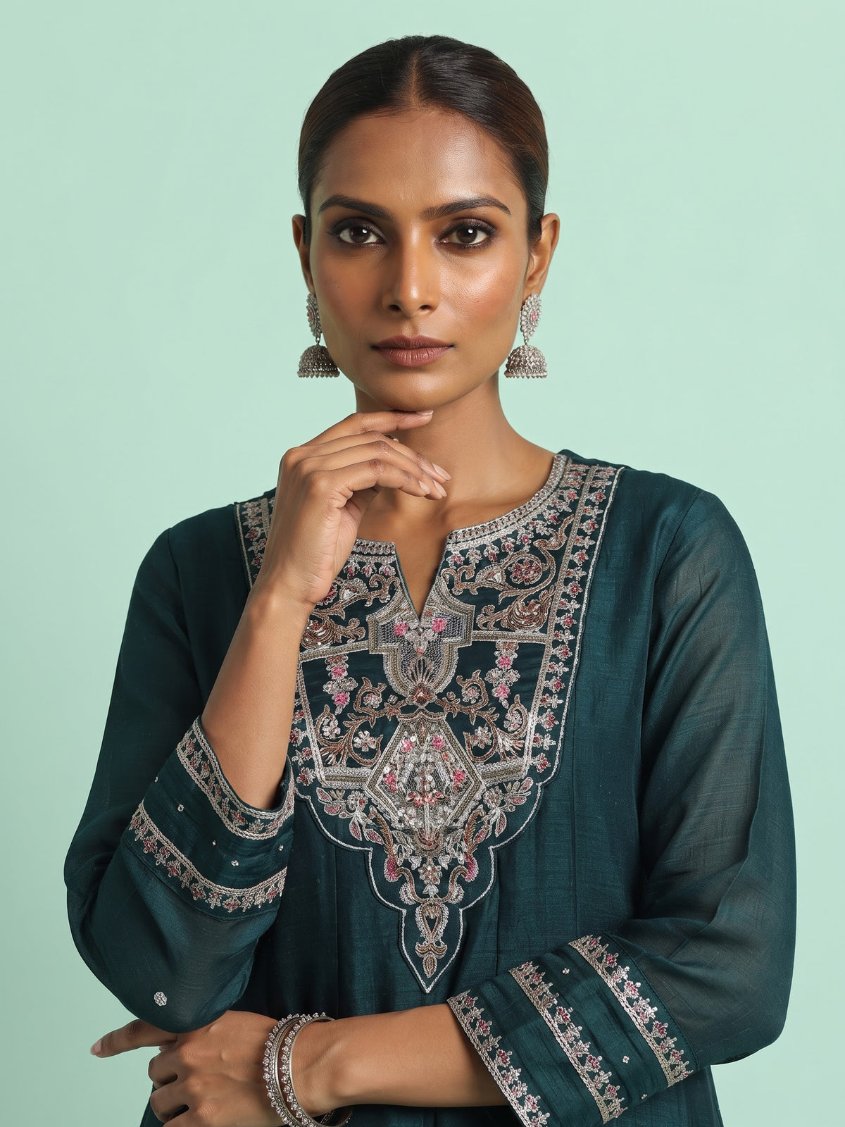 Bottle green chanderi silk anarkali suit with embellished sweetheart neckline