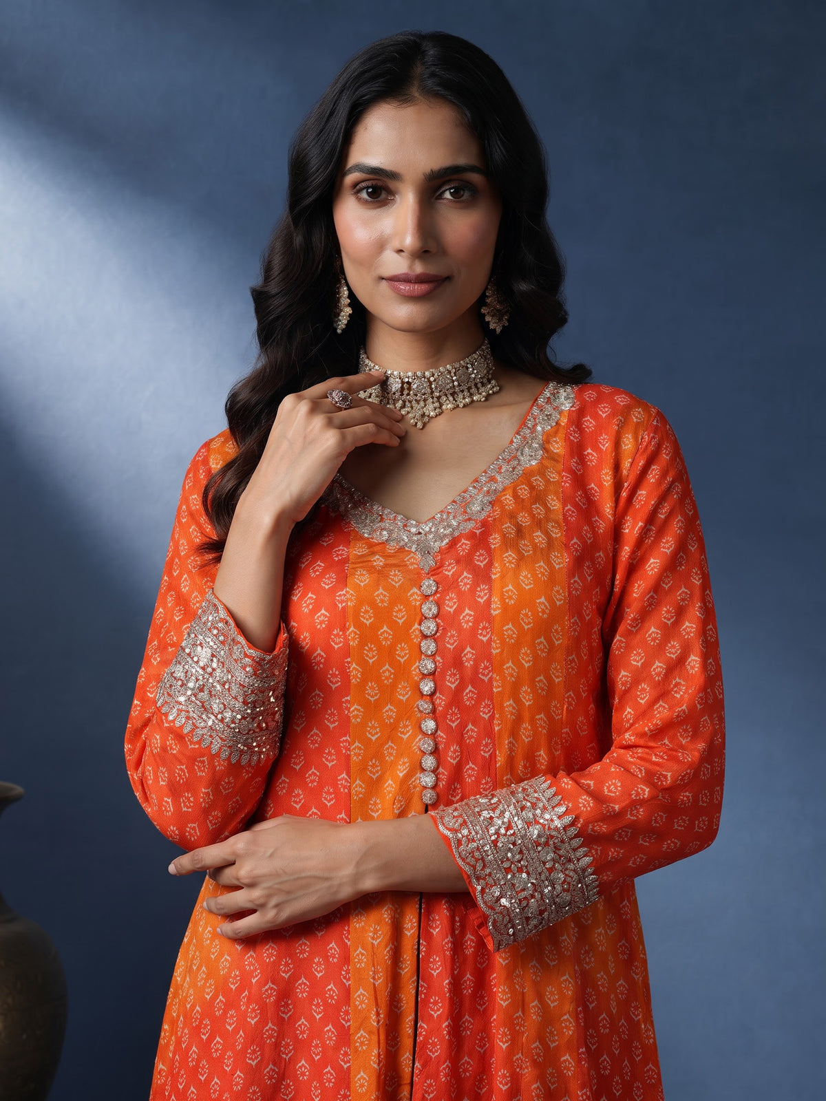 Rust orange modal silk anarkali suit with embroidered neckline