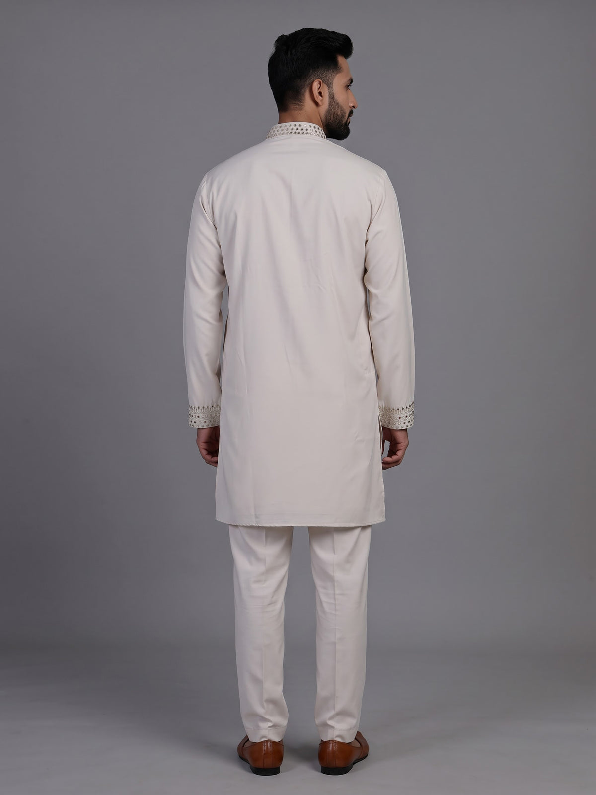Off white short kurta suit with gold embroidered bib